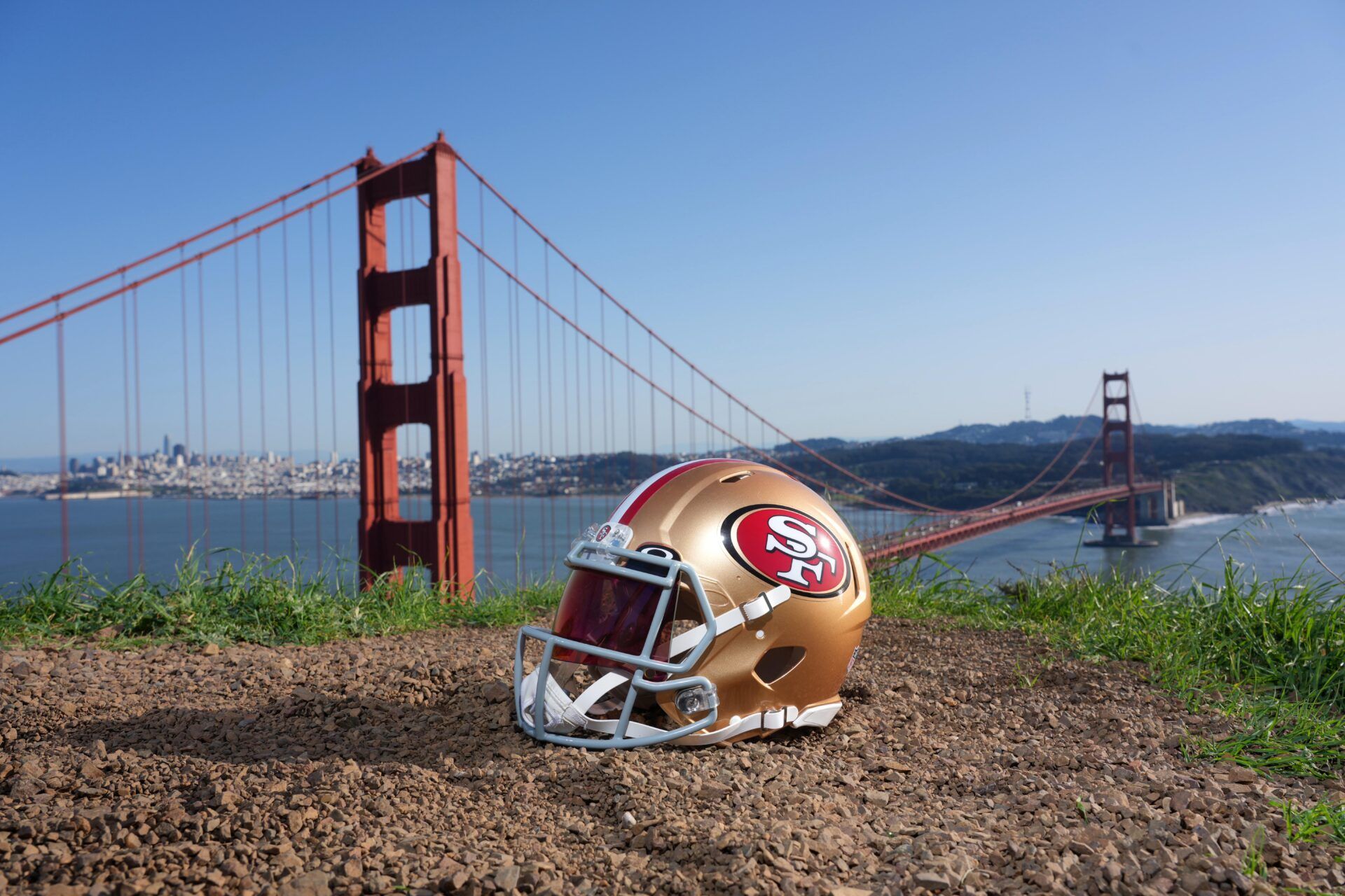 A San Francisco 49ers helmet at the Golden Gate bridge.