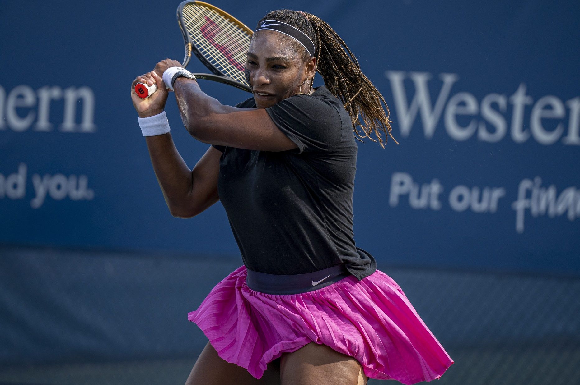 Serena Williams practices on Court 16 before her match during the Western & Southern Open at the Lindner Family Tennis Center in Mason Tuesday, August 16, 2022.