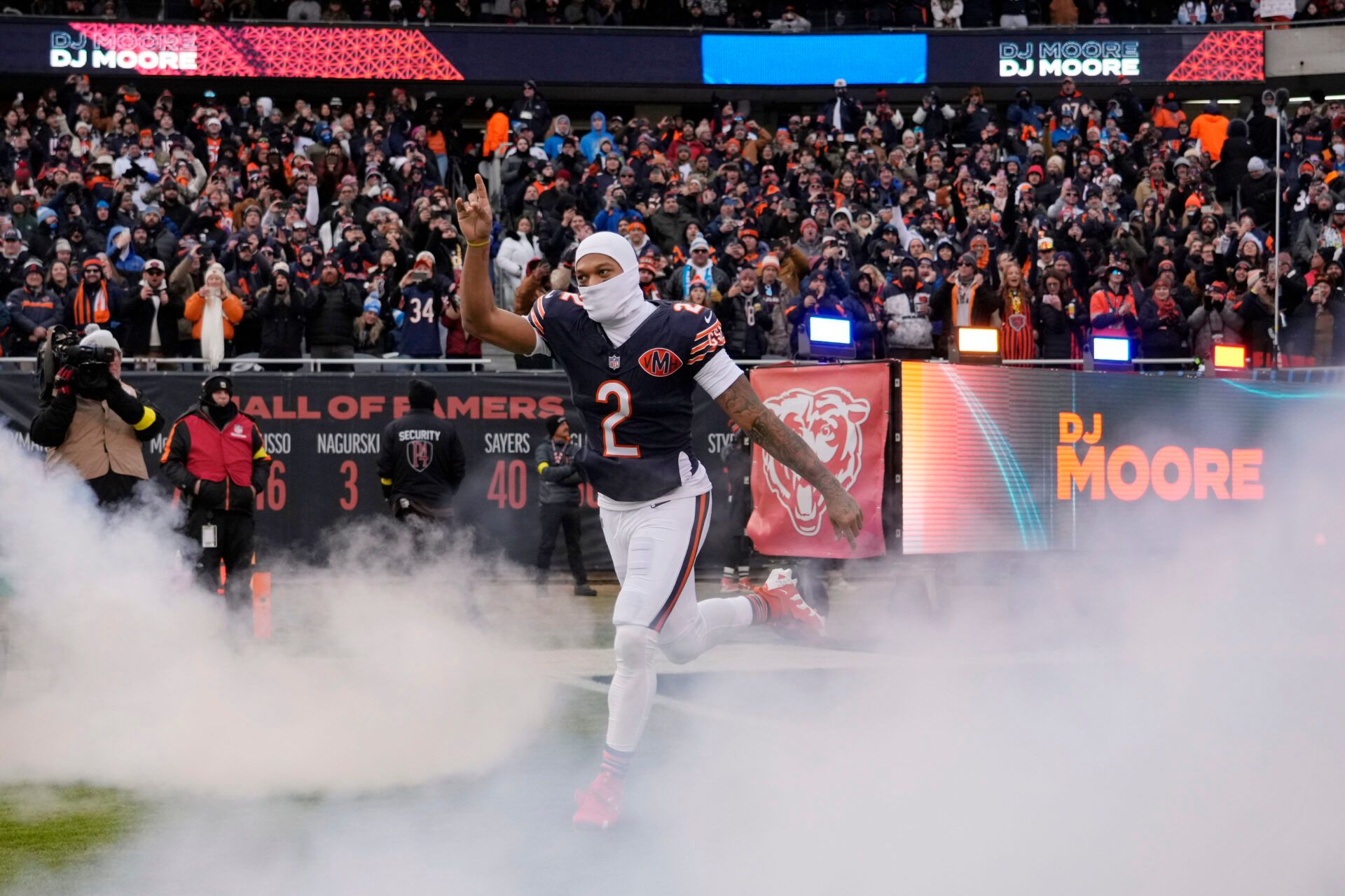 Chicago Bears wide receiver DJ Moore (2) runs onto the field before the game between the Chicago Bears and the Detroit Lions at Soldier Field.