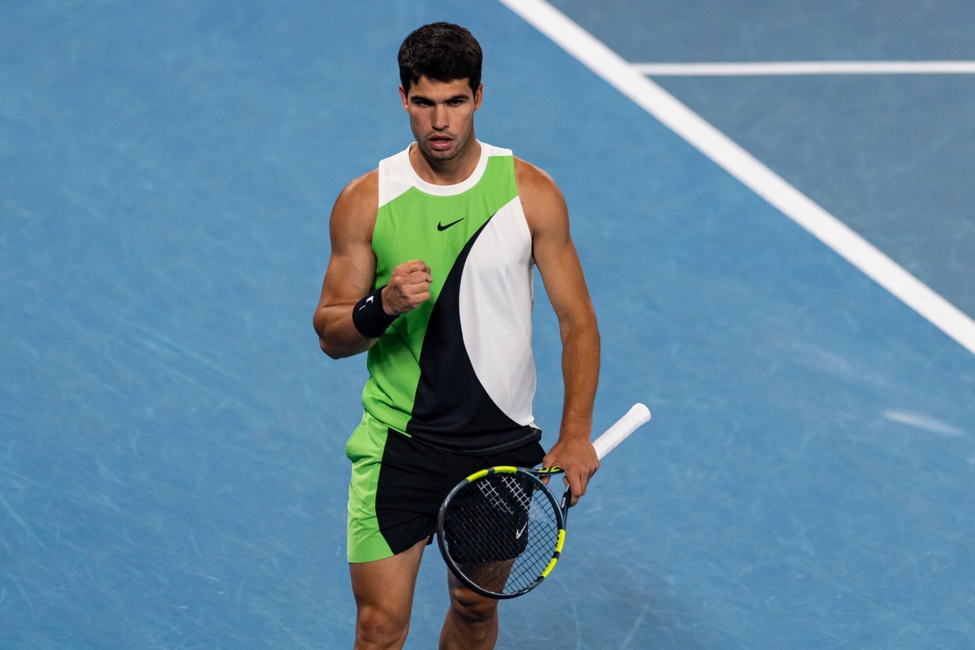 Carlos Alcaraz of Spain in action against Novak Djokovic of Serbia in the final of the mens singles at the Australian Open at Rod Laver Arena in Melbourne Park.