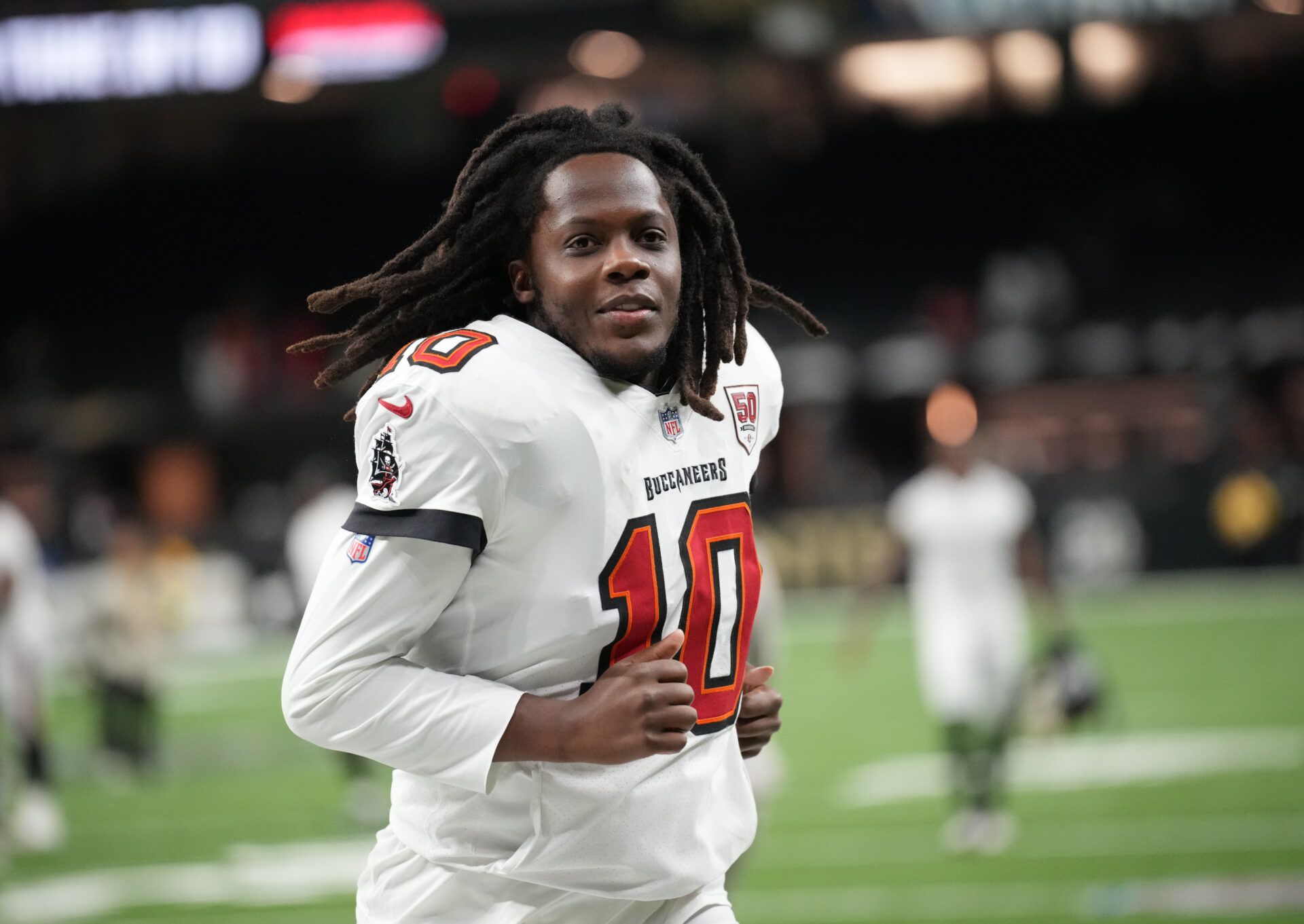Tampa Bay Buccaneers quarterback Teddy Bridgewater (10) runs off the field following a win over the New Orleans Saints at Caesars Superdome.
