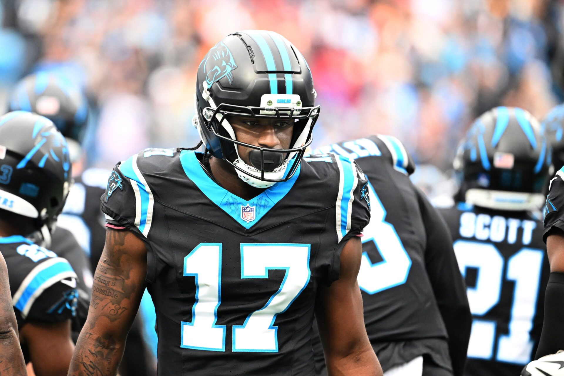 Carolina Panthers wide receiver Xavier Legette (17) runs on to the field before the game at Bank of America Stadium.