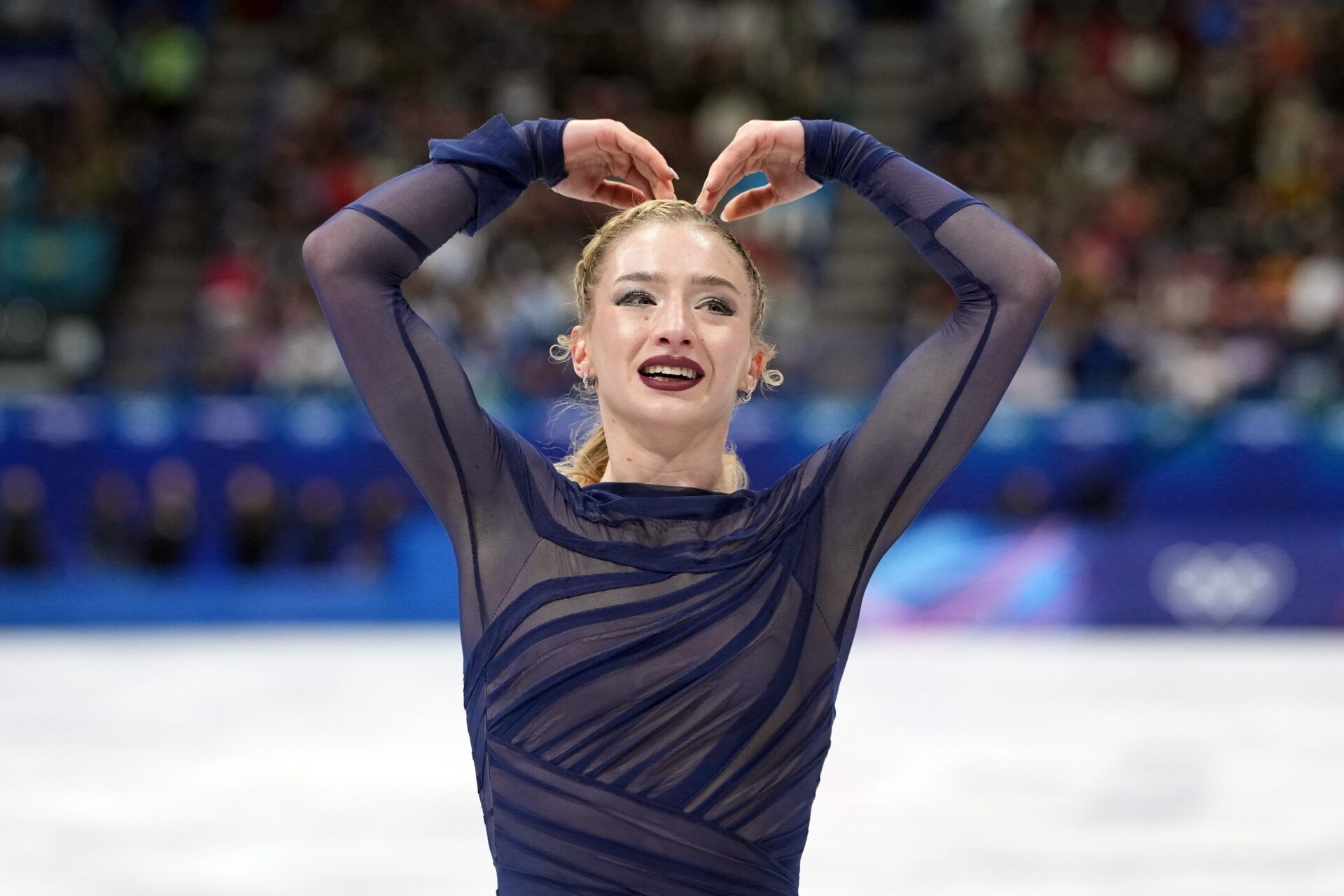 Amber Glenn of the United States competes in the women's free skate during the Milano Cortina 2026 Olympic Winter Games at Milano Ice Skating Arena.