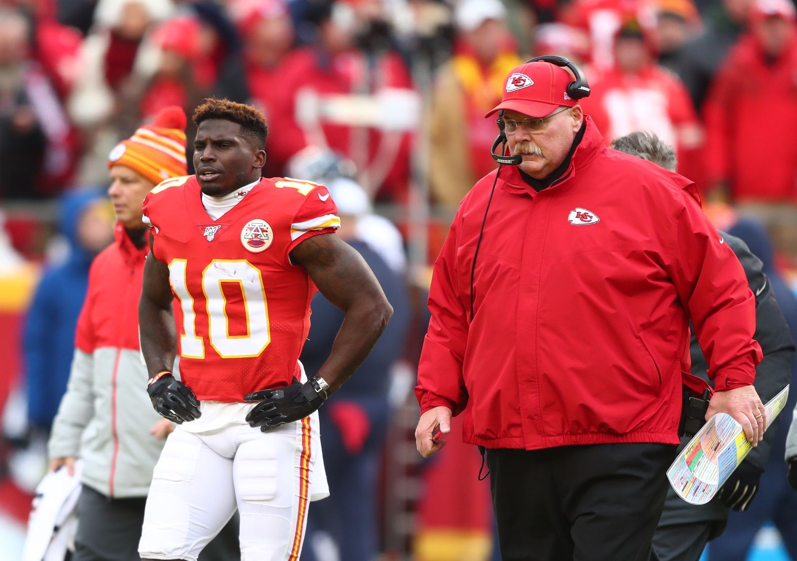 Kansas City Chiefs wide receiver Tyreek Hill (10) and head coach Andy Reid against the Houston Texans in the AFC Divisional Round playoff football game at Arrowhead Stadium.