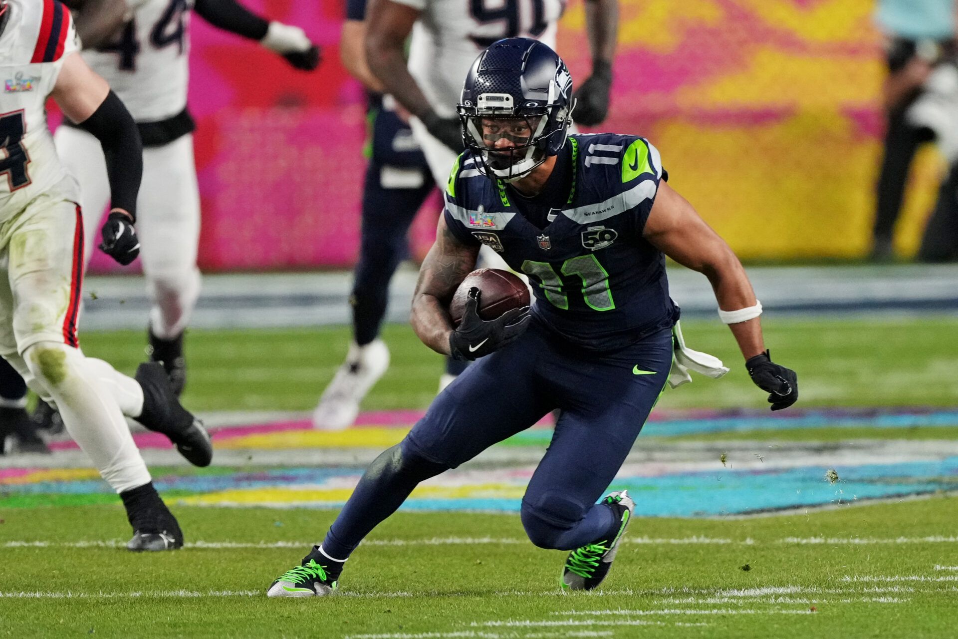 Seattle Seahawks wide receiver Jaxon Smith-Njigba (11) runs the ball during the third quarter against the New England Patriots in Super Bowl LX at Levi's Stadium.