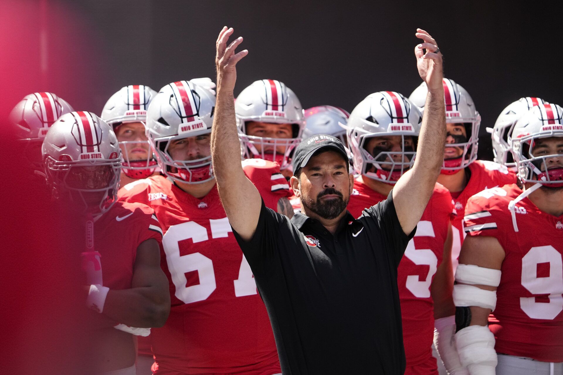 Ohio State Buckeyes head coach Ryan Day leads his team onto the field prior to the NCAA football game against the Texas Longhorns at Ohio Stadium on Aug. 30, 2025.