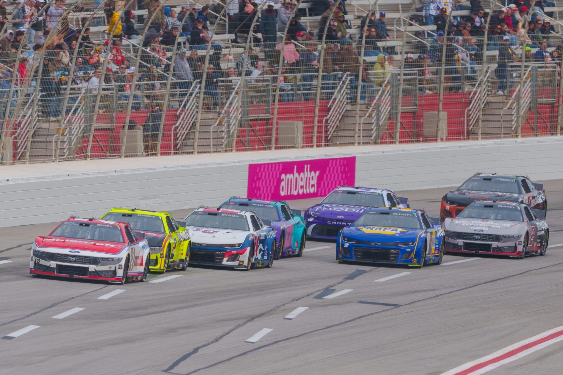 Josh Berry (21) fights to maintain the lead going into turn one at Atlanta Motor Speedway.