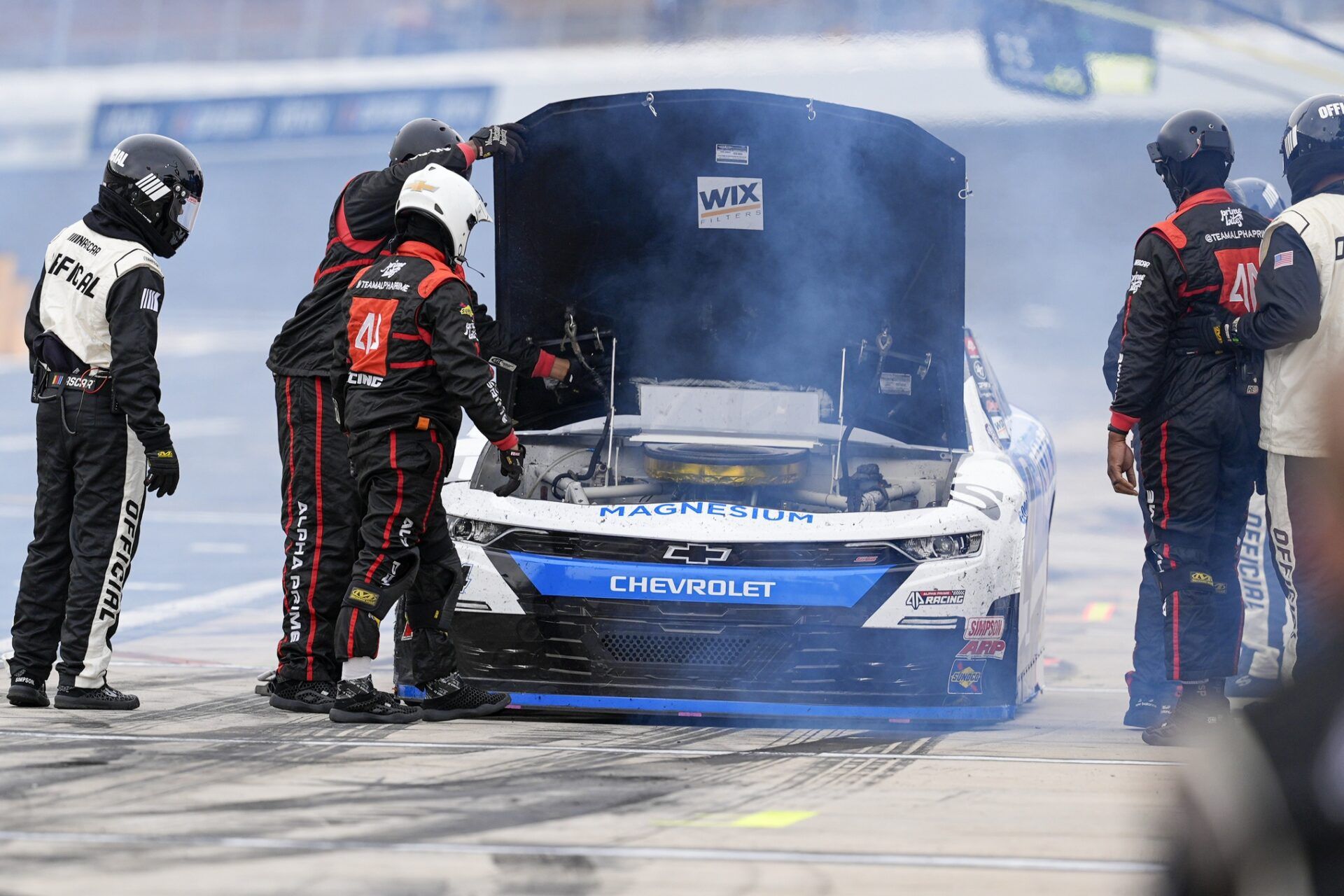 Parker Retzlaff (4) pits with an engine problem during the Bet MGM 300 at Charlotte Motor Speedway.