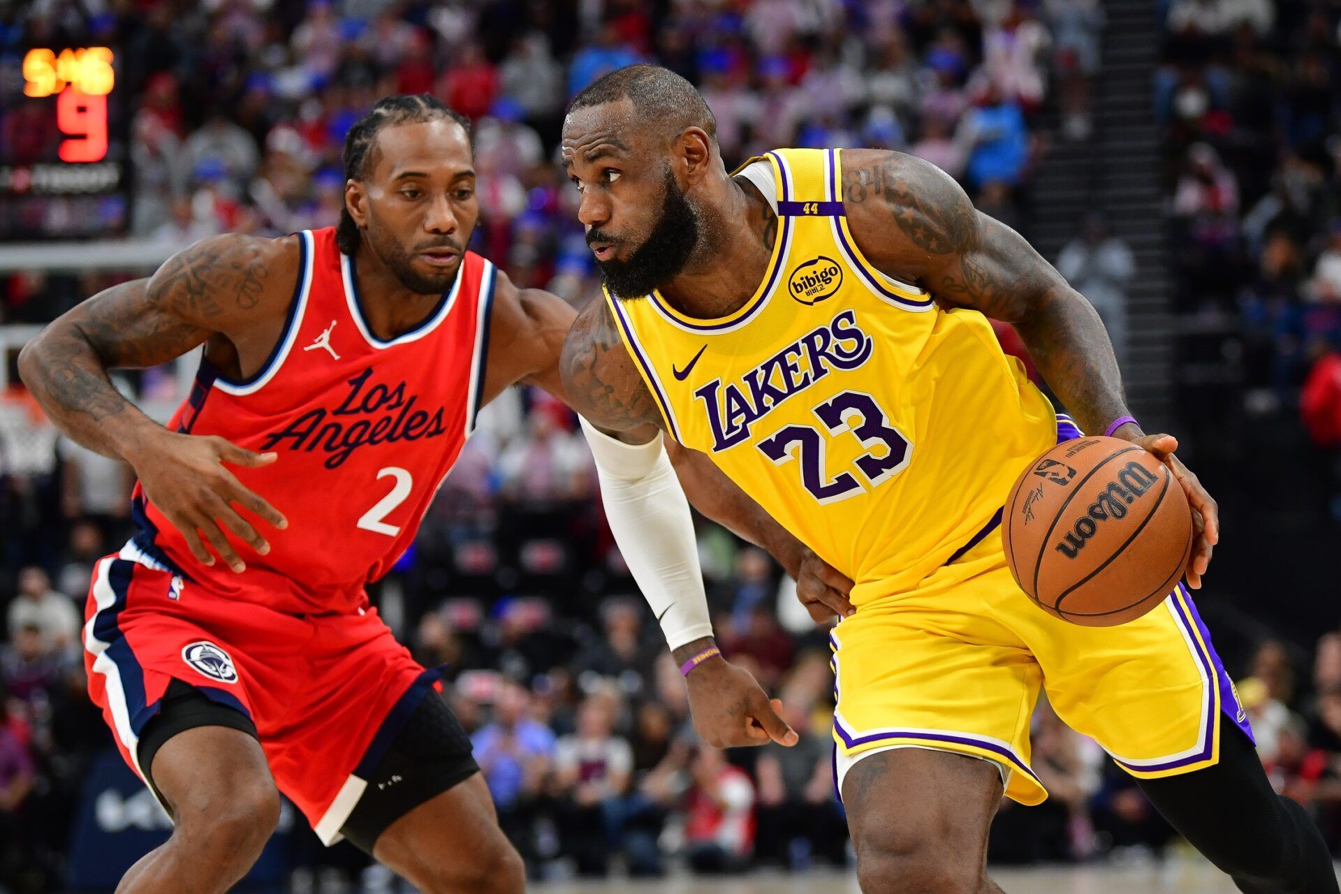 Los Angeles Lakers forward LeBron James (23) moves the ball against Los Angeles Clippers forward Kawhi Leonard (2) during the second half at Intuit Dome.