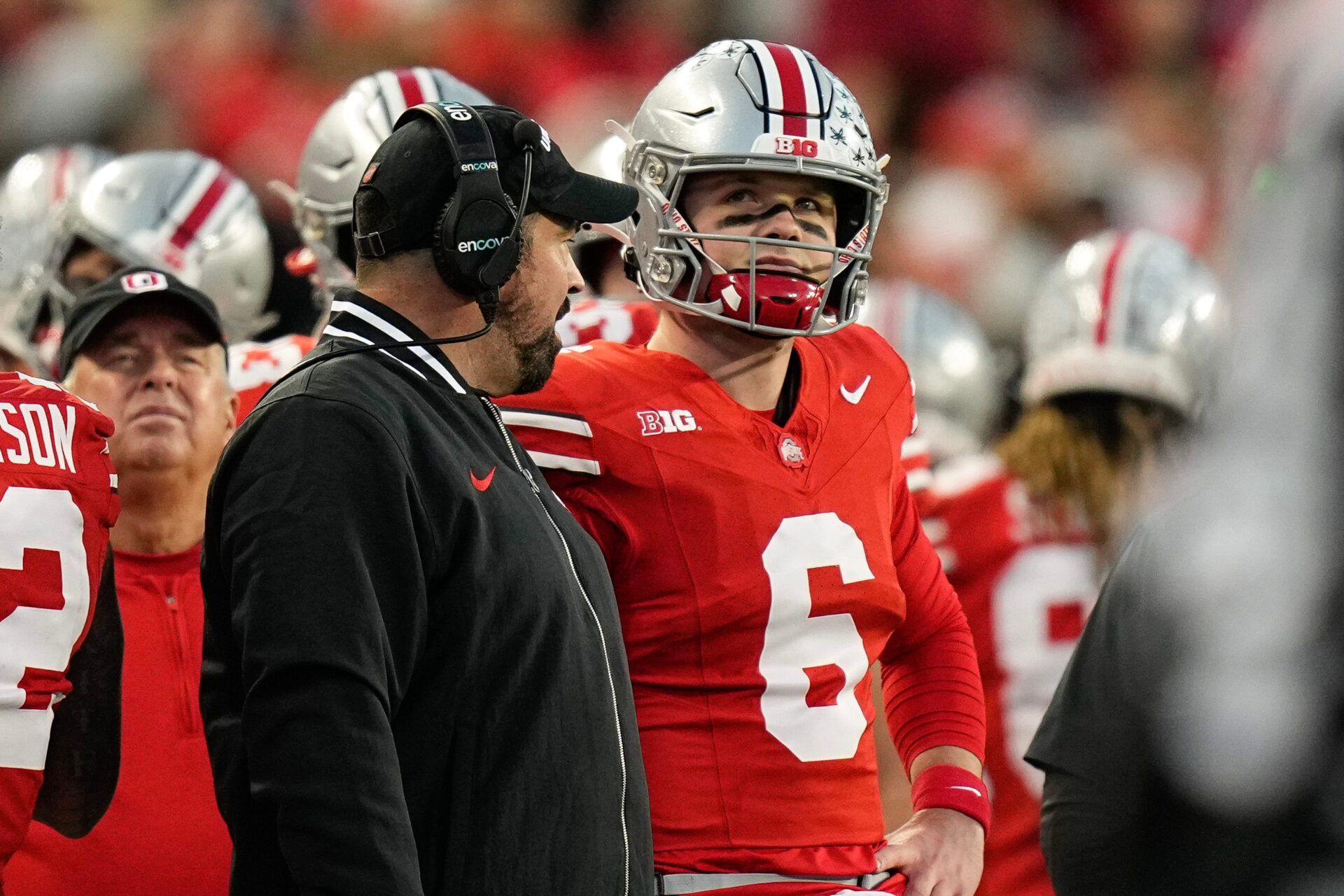 Ohio State Buckeyes head coach Ryan Day talks to quarterback Kyle McCord (6) during the first half of the NCAA football game against the Minnesota Golden Gophers at Ohio Stadium.