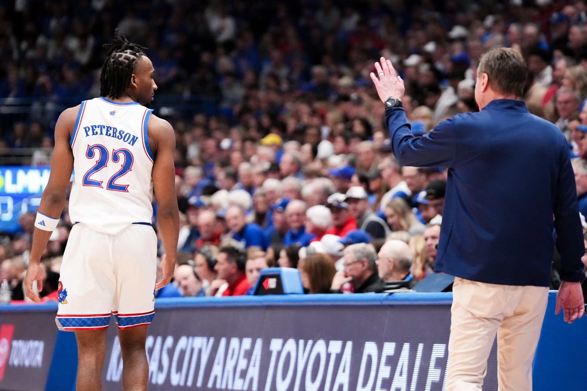 Kansas Jayhawks head coach Bill Self gestures to guard Darryn Peterson (22) against the Cincinnati Bearcats during the second half of the game at Allen Fieldhouse.