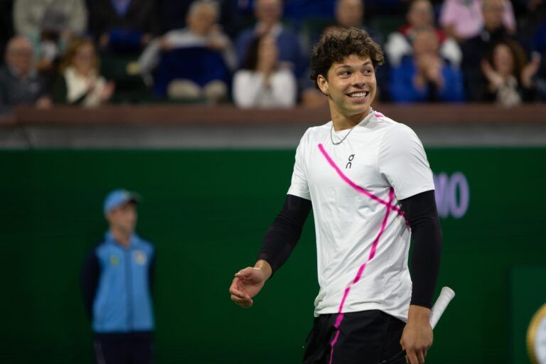 American Ben Shelton smiles as he walks across the court inside Stadium 2 at the Indian Wells Tennis Garden during the 2024 Eisenhower Cup on March 5, 2024.
