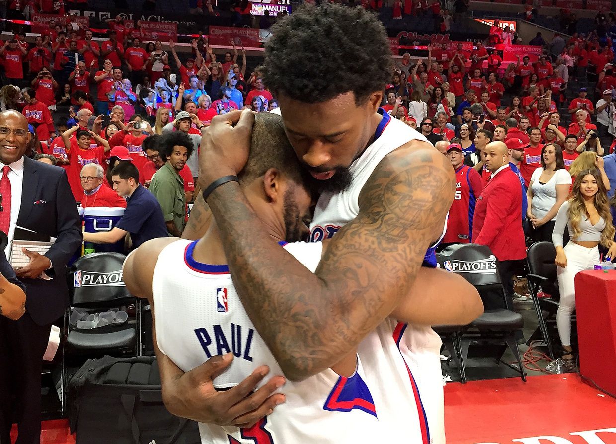 Los Angeles Clippers center DeAndre Jordan (6) and guard Chris Paul (3) hug after defeating the San Antonio Spurs in game seven of the first round of the NBA Playoffs against the San Antonio Spurs at Staples Center. Clippers won 111-109.