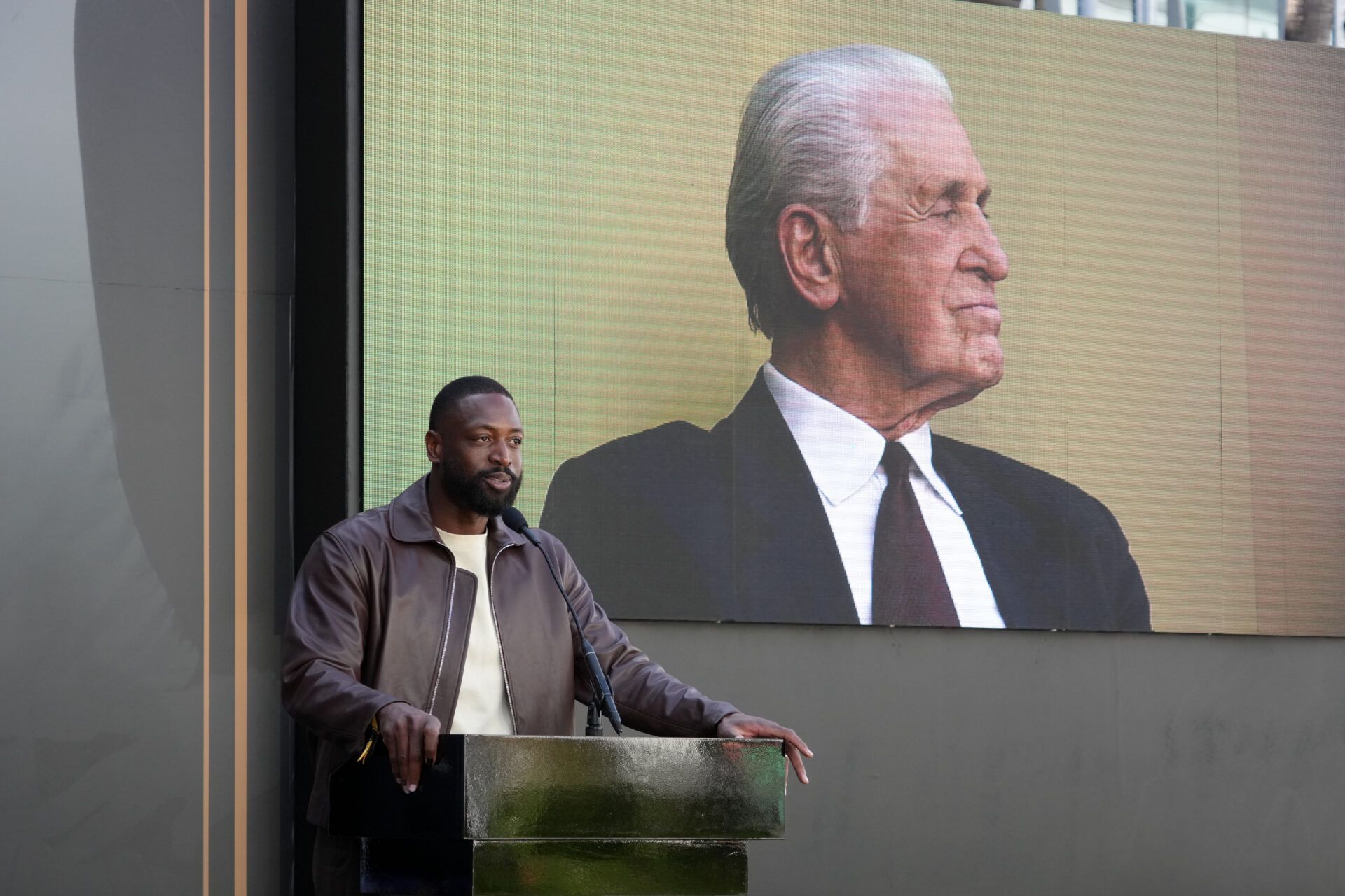 Dwayne Wade speaks at unveiling of statue of former Los Angeles Lakers coach Pat Riley at the Crypto.com Arena.