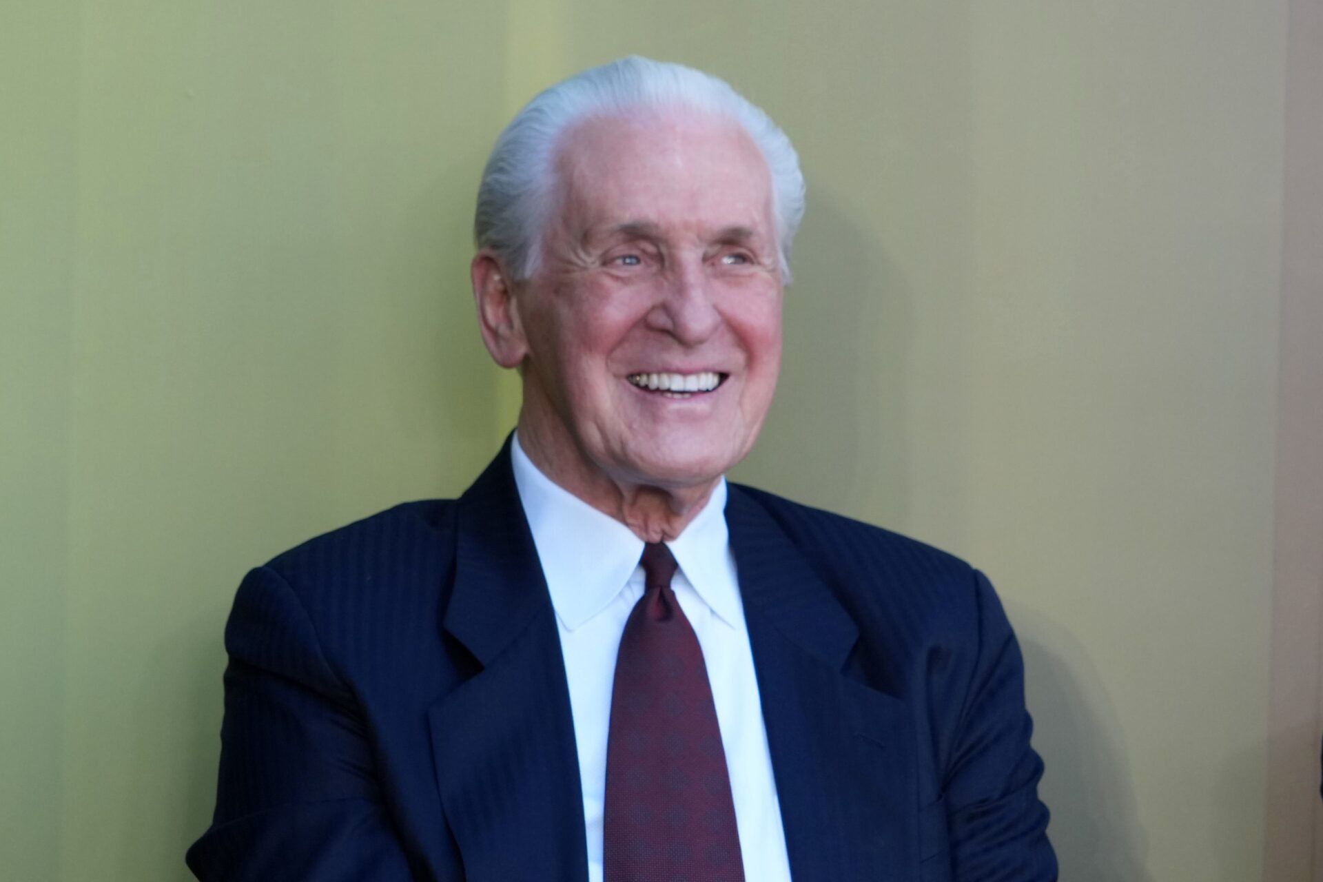 Los Angeles Lakers former coach Pat Riley reacts at statue unveiling at the Crypto.com Arena.