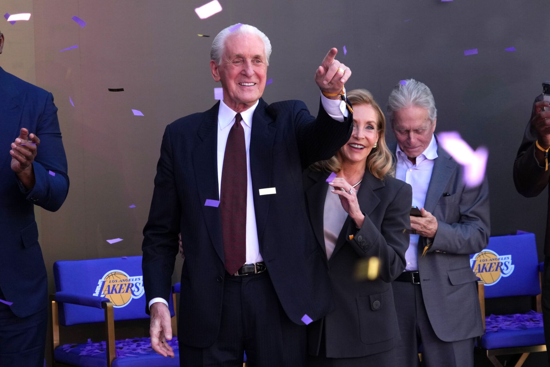 Los Angeles Lakers former coach Pat Riley and wife Chris Rodstrom watch as statue of Riley is unveiled at the Crypto.com Arena.