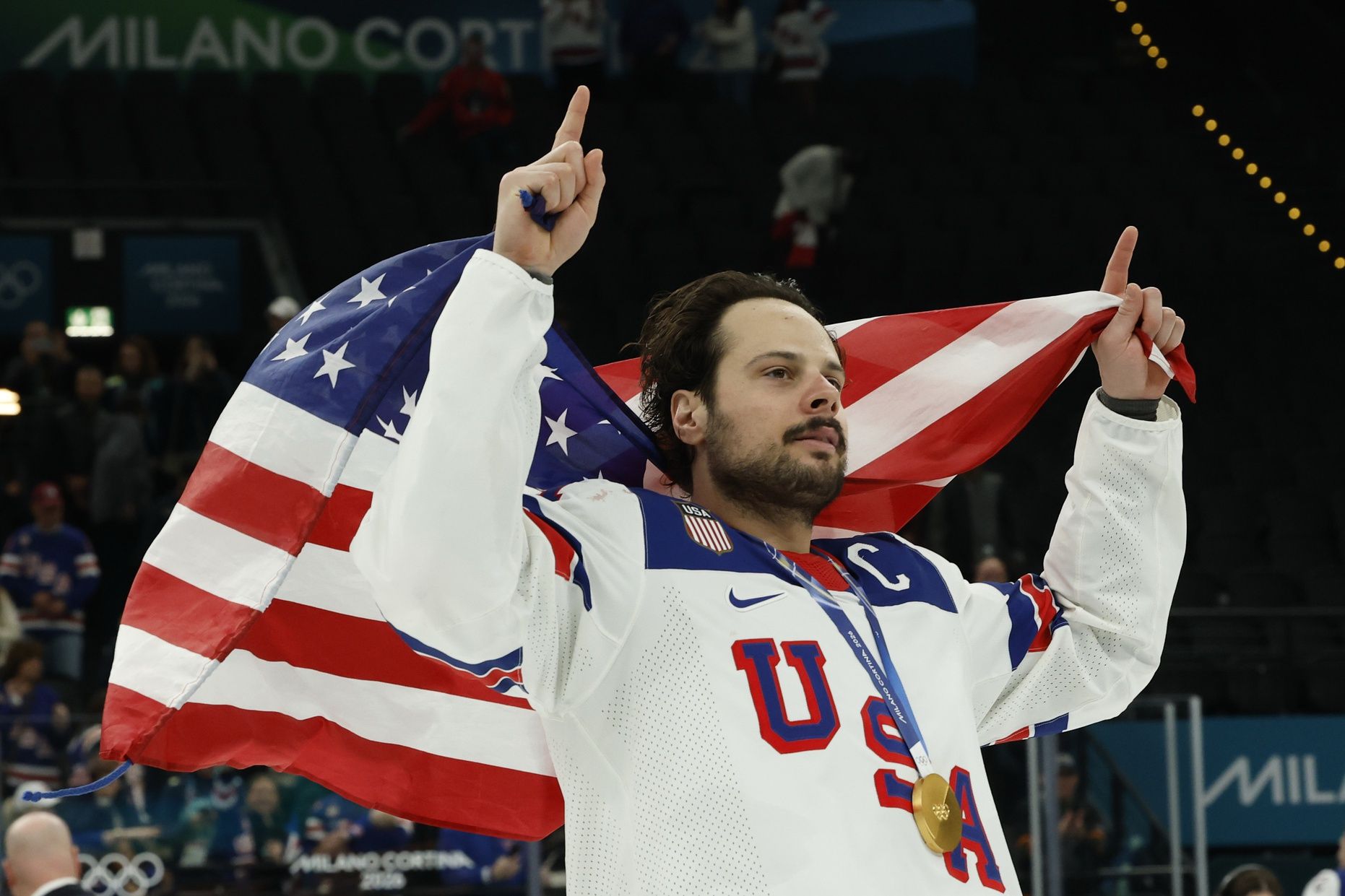 Auston Matthews #34 of Team United States celebrates after the game against Team Canada during the Milano Cortina 2026 Olympic Winter Games at Milano Santagiulia Ice Hockey Arena.