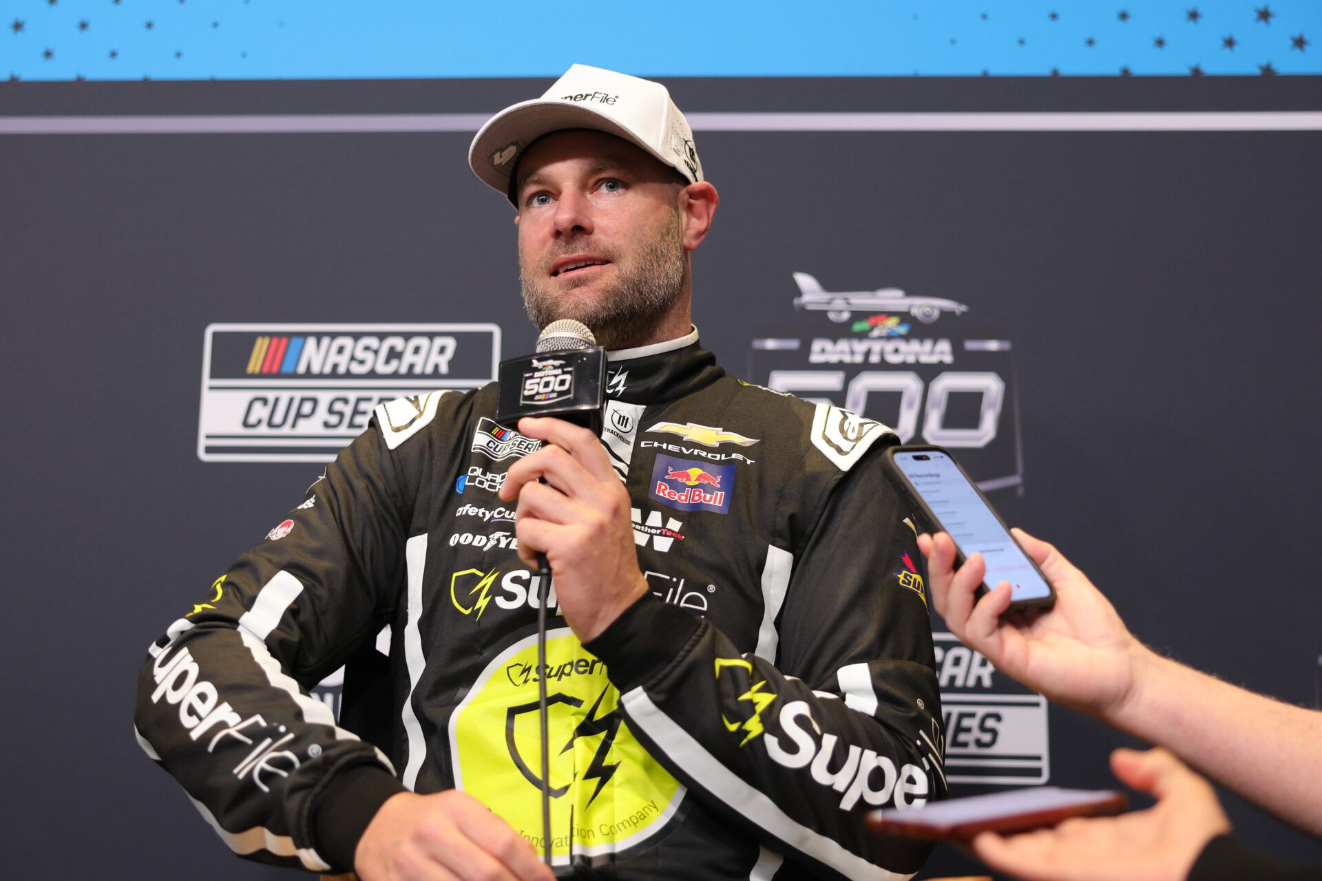 NASCAR Cup Series driver Shane Van Gisbergen (97) speaks to the media during the Daytona 500 Media Day at Daytona International Speedway.