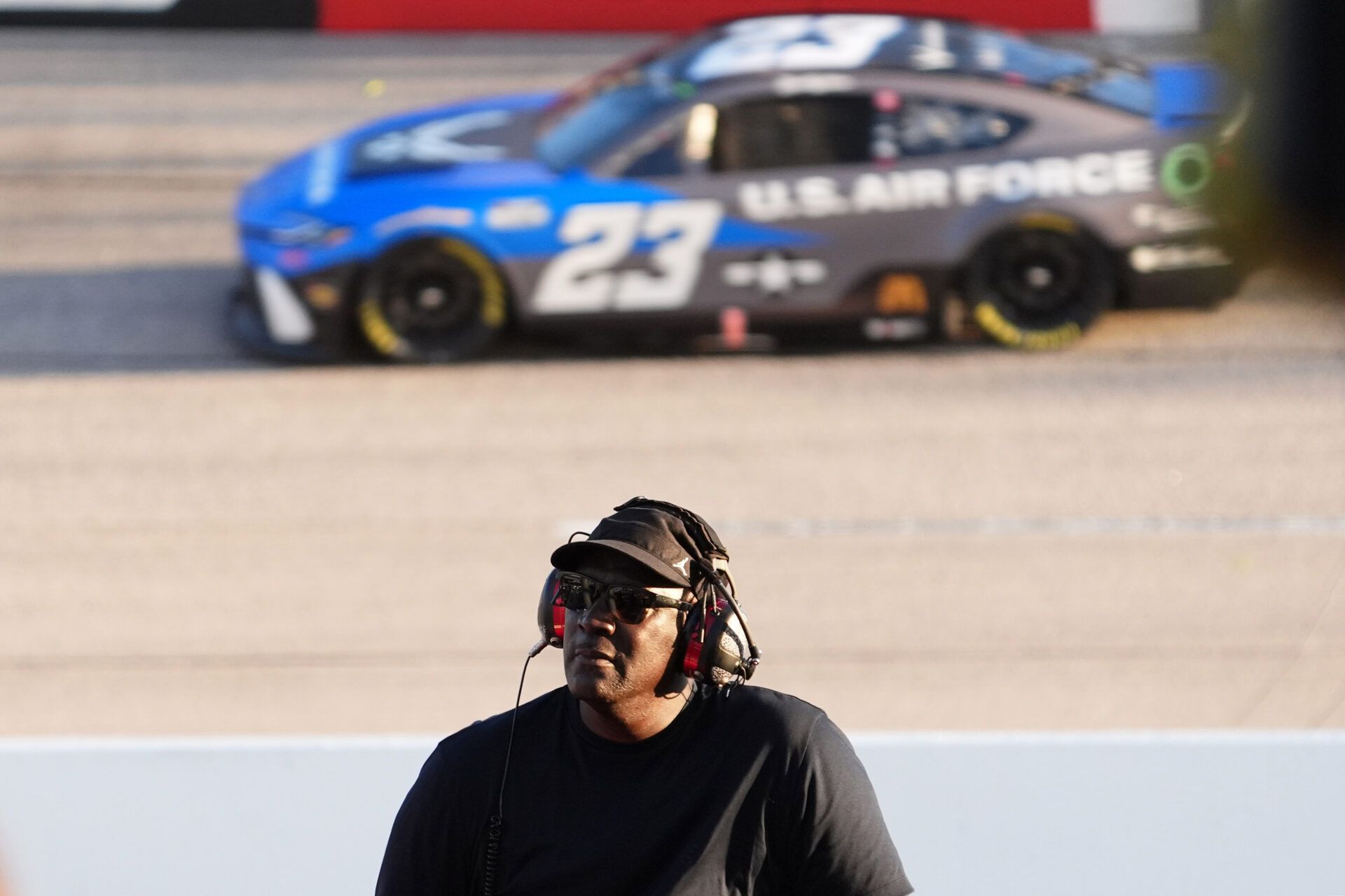 NASCAR Cup Series Team 23XI owner Michael Jordan watches a video board as NASCAR Cup Series driver Bubba Wallace (23) races during the Cook Out Southern 500 at Darlington Raceway.