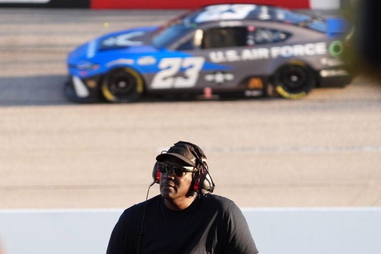 NASCAR Cup Series Team 23XI owner Michael Jordan watches a video board as NASCAR Cup Series driver Bubba Wallace (23) races during the Cook Out Southern 500 at Darlington Raceway.