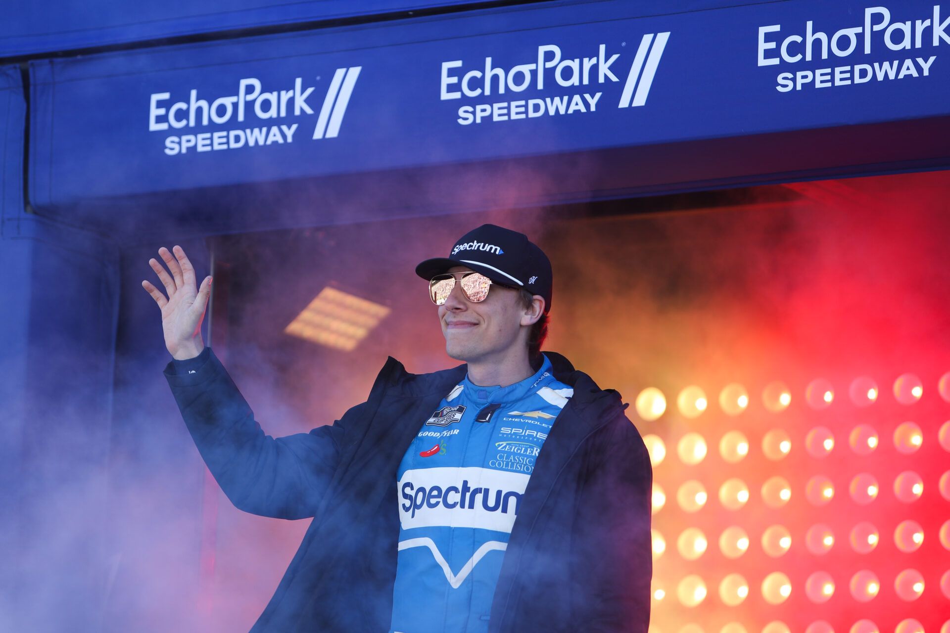 NASCAR Cup Series driver Carson Hocevar waves during introductions at EchoPark Speedway.