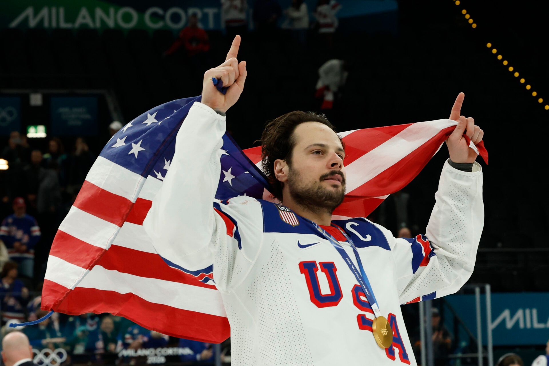 Auston Matthews #34 of Team United States celebrates after the game against Team Canada during the Milano Cortina 2026 Olympic Winter Games at Milano Santagiulia Ice Hockey Arena.