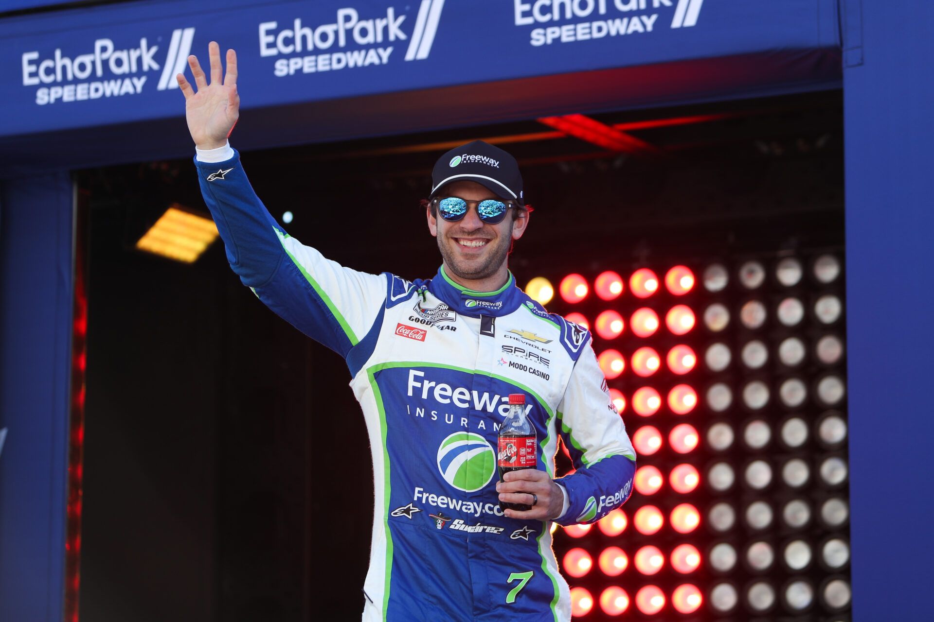 NASCAR Cup Series driver Daniel Suarez waves during introductions at EchoPark Speedway.