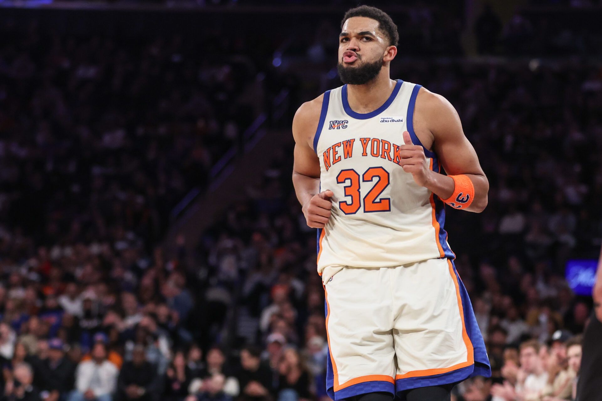 New York Knicks center Karl-Anthony Towns (32) celebrates after scoring in the third quarter against the Houston Rockets at Madison Square Garden.