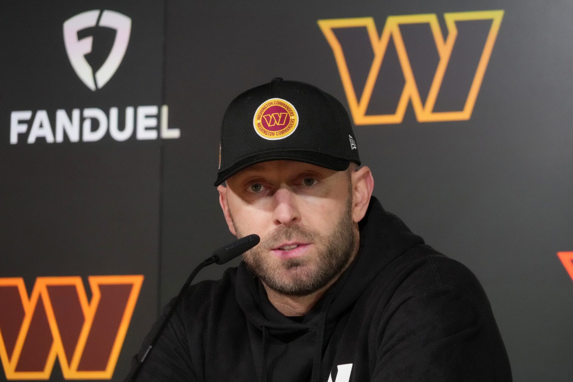 Washington Commanders offensive coordinator Kliff Kingsbury at press conference at Ciudad Deportiva del Real Madrid.