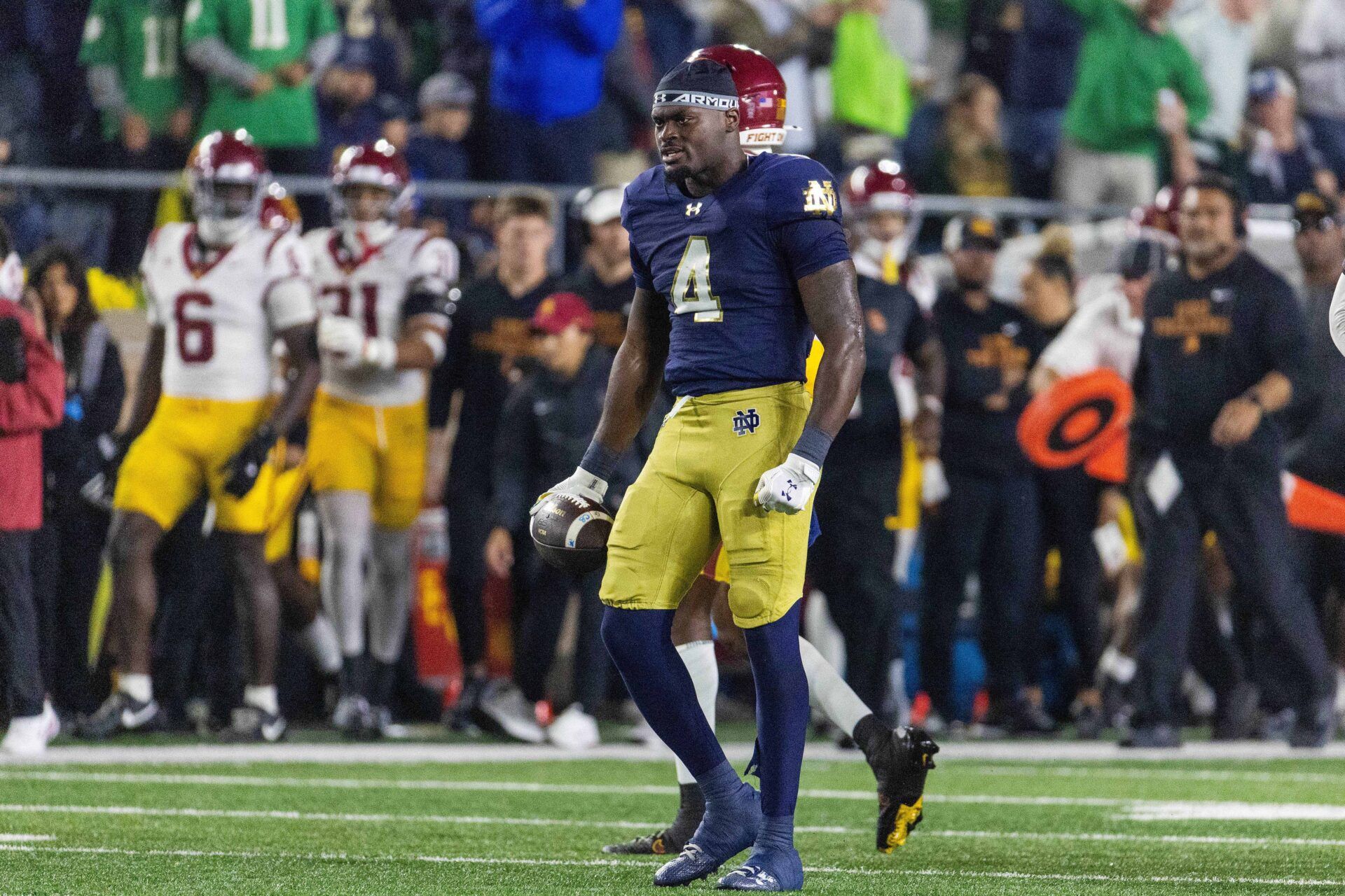 Notre Dame Fighting Irish running back Jeremiyah Love (4) celebrates a run in the first half against the Southern California Trojans at Notre Dame Stadium.