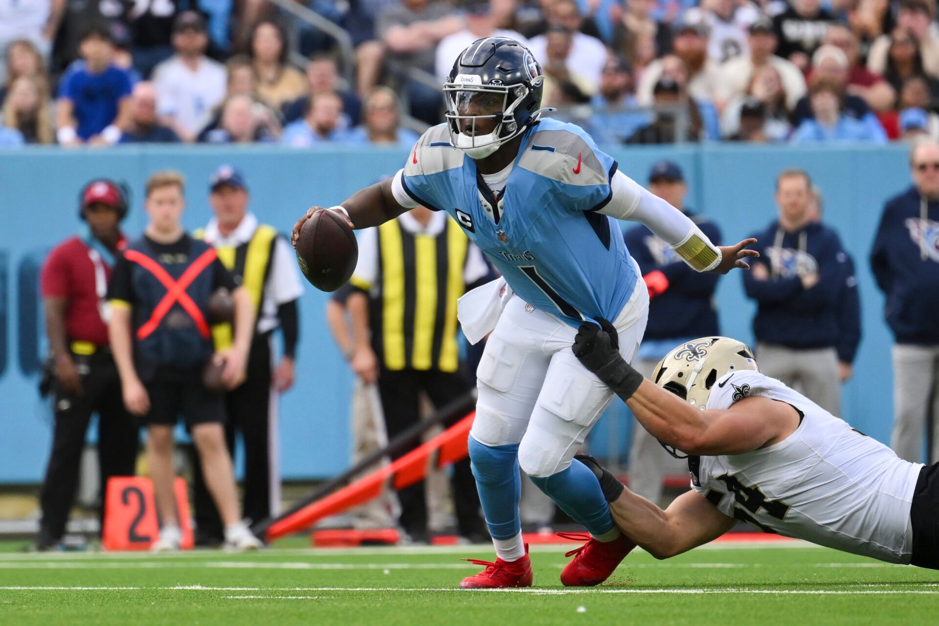 New Orleans Saints defensive end Jonah Williams (54) sacks Tennessee Titans quarterback Cam Ward (1) during the second half of the game at Nissan Stadium.