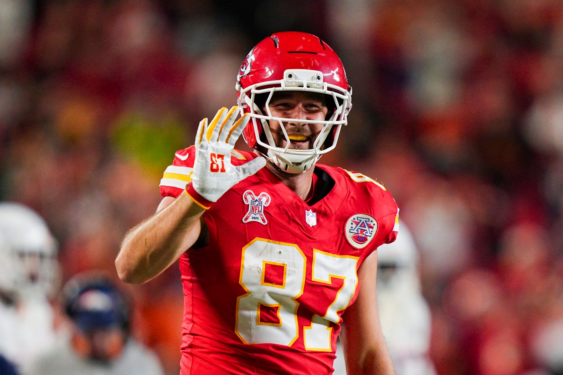 Kansas City Chiefs tight end Travis Kelce (87) reacts after making a catch for a first down during the first half against the Denver Broncos at GEHA Field at Arrowhead Stadium.