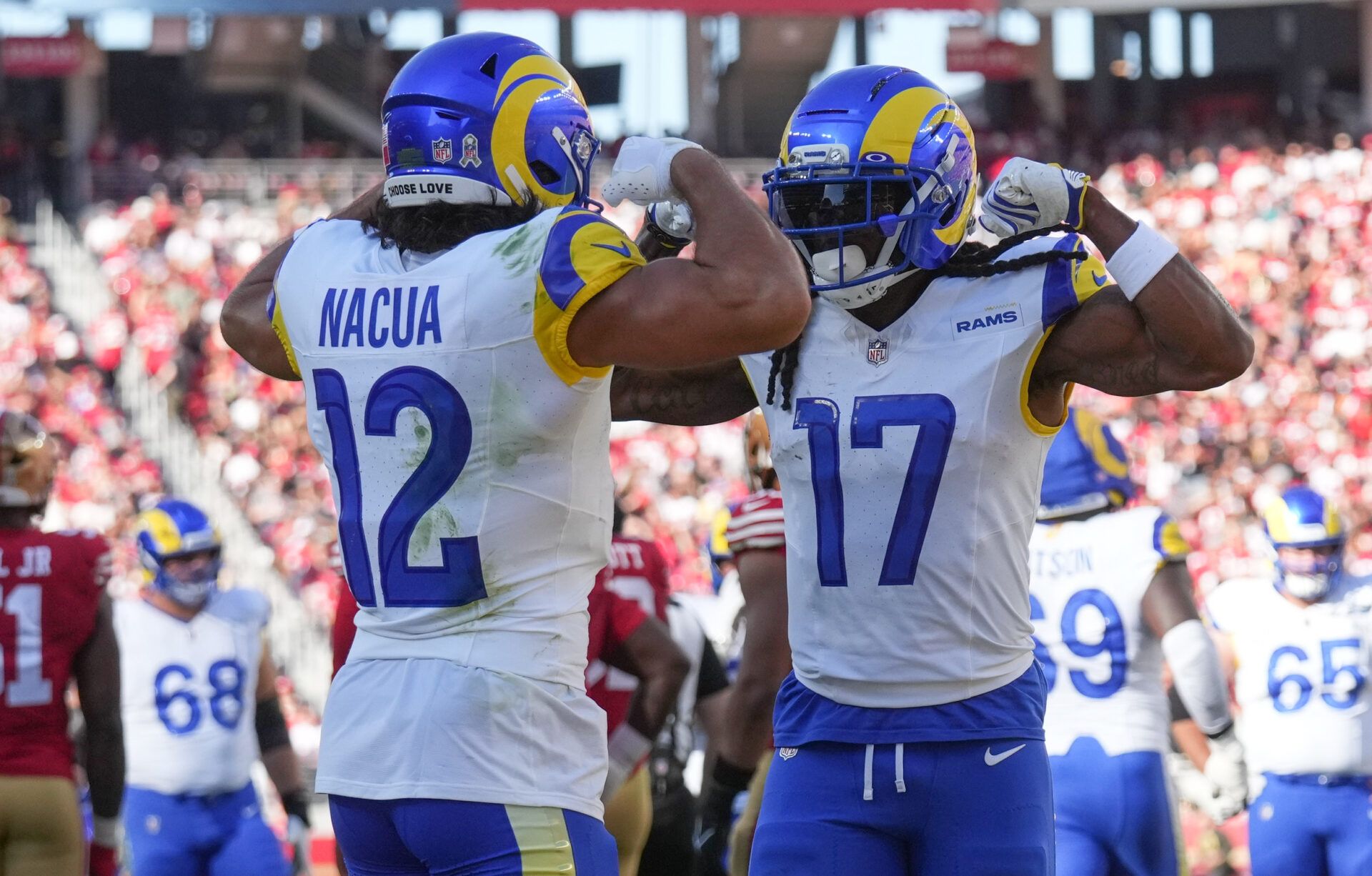 Los Angeles Rams wide receiver Puka Nacua (12) and Los Angeles Rams wide receiver Davante Adams (17) celebrate after a touchdown during the first quarter against the San Francisco 49ers at Levi's Stadium.