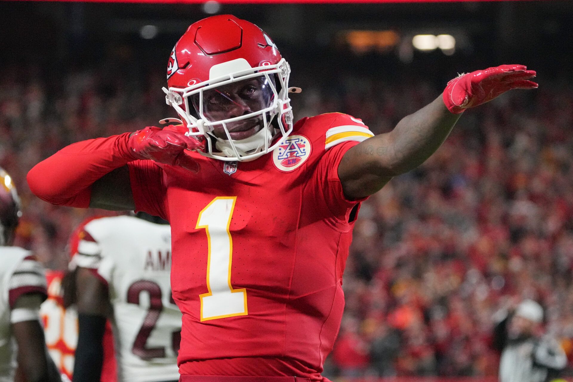 Kansas City Chiefs wide receiver Xavier Worthy (1) celebrates after a play against the Washington Commanders during the first quarter of the game at GEHA Field at Arrowhead Stadium.