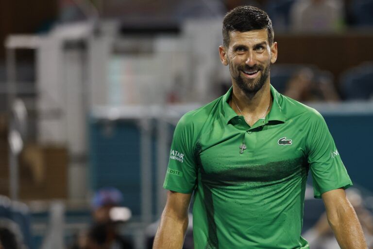 Novak Djokovic (SRB) smiles after winning a point against Jakub Mensik (CZE)(not pictured) in the men's singles championship of the Miami Open at Hard Rock Stadium.