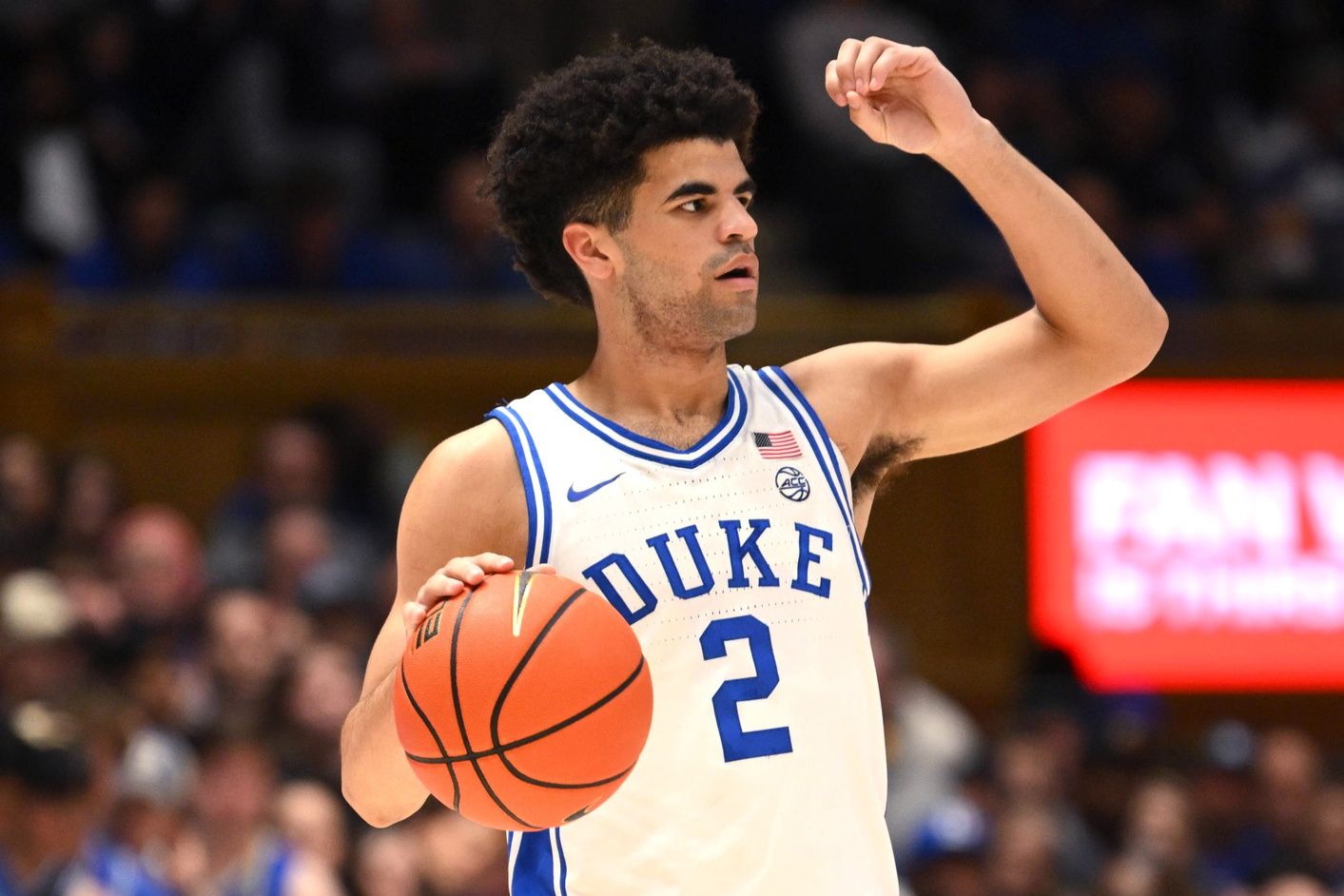 Duke Blue Devils guard Cayden Boozer (2) makes a call during the second half against the Syracuse Orange at Cameron Indoor Stadium.