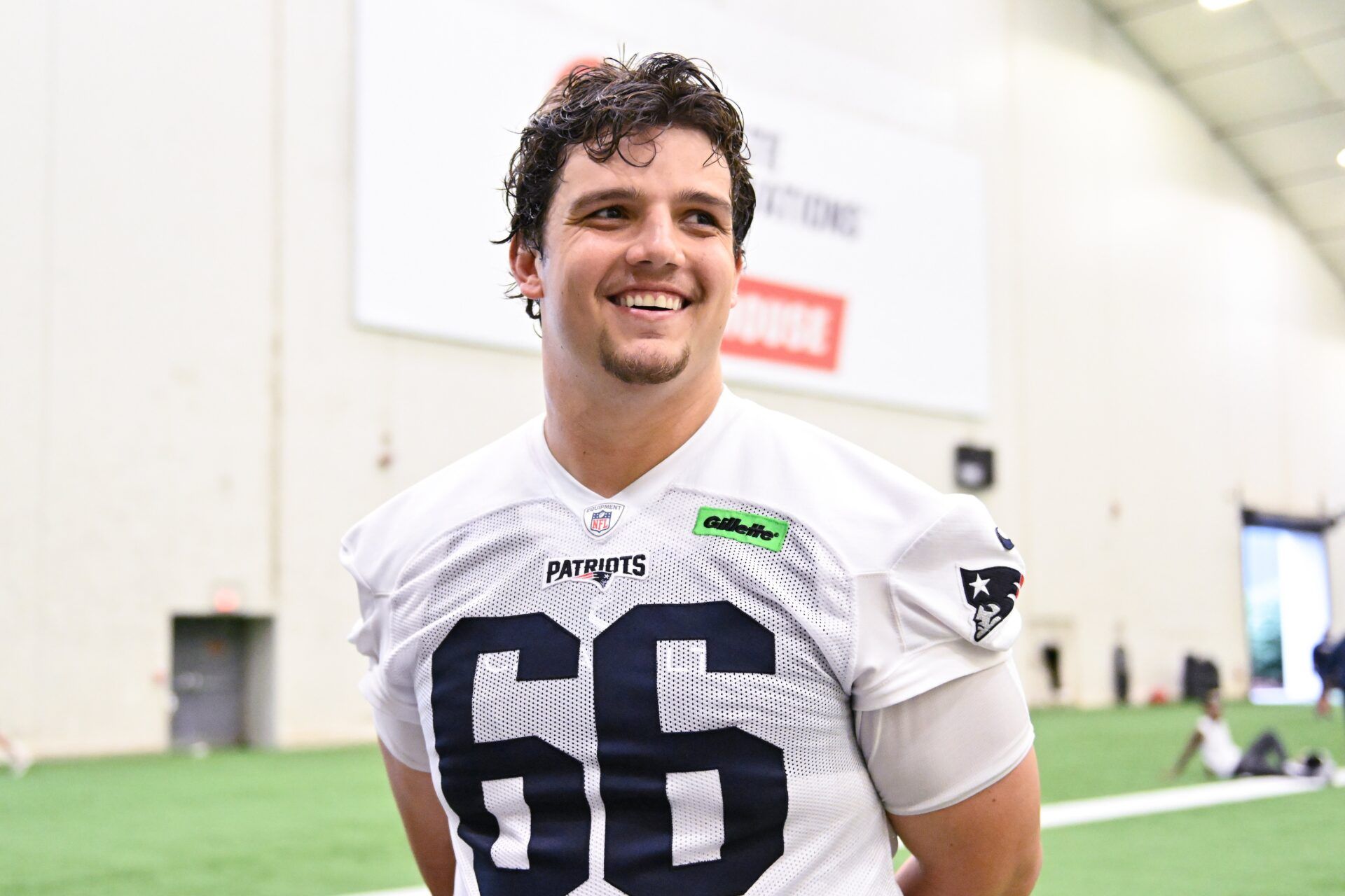 New England Patriots offensive tackle Will Campbell (66) speaks to the media after minicamp held in the WIN Field House at Gillette Stadium.