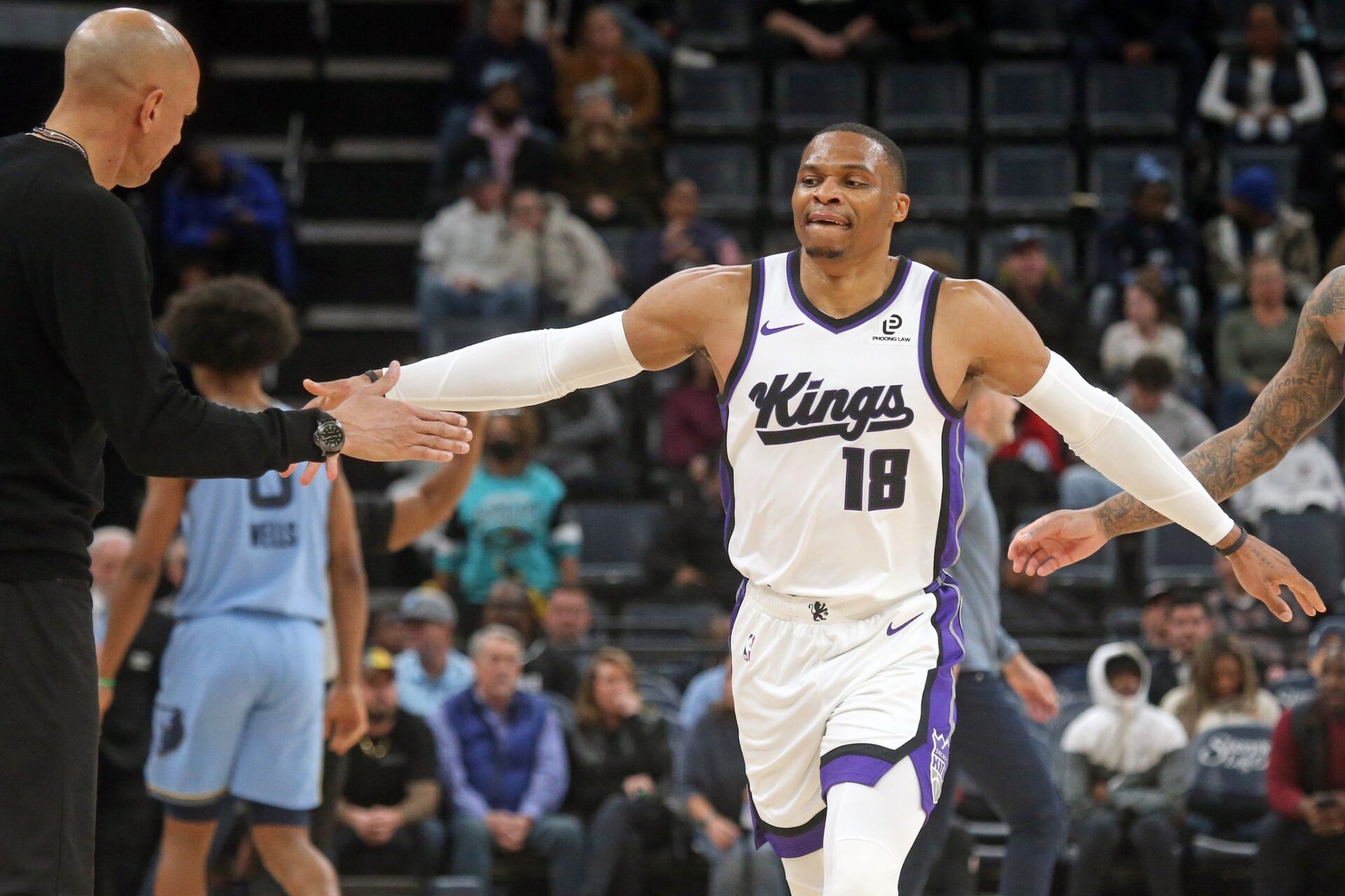 Sacramento Kings guard Russell Westbrook (18) reacts with head coach Doug Christie during a timeout during the fourth quarter against the Memphis Grizzlies at FedExForum.