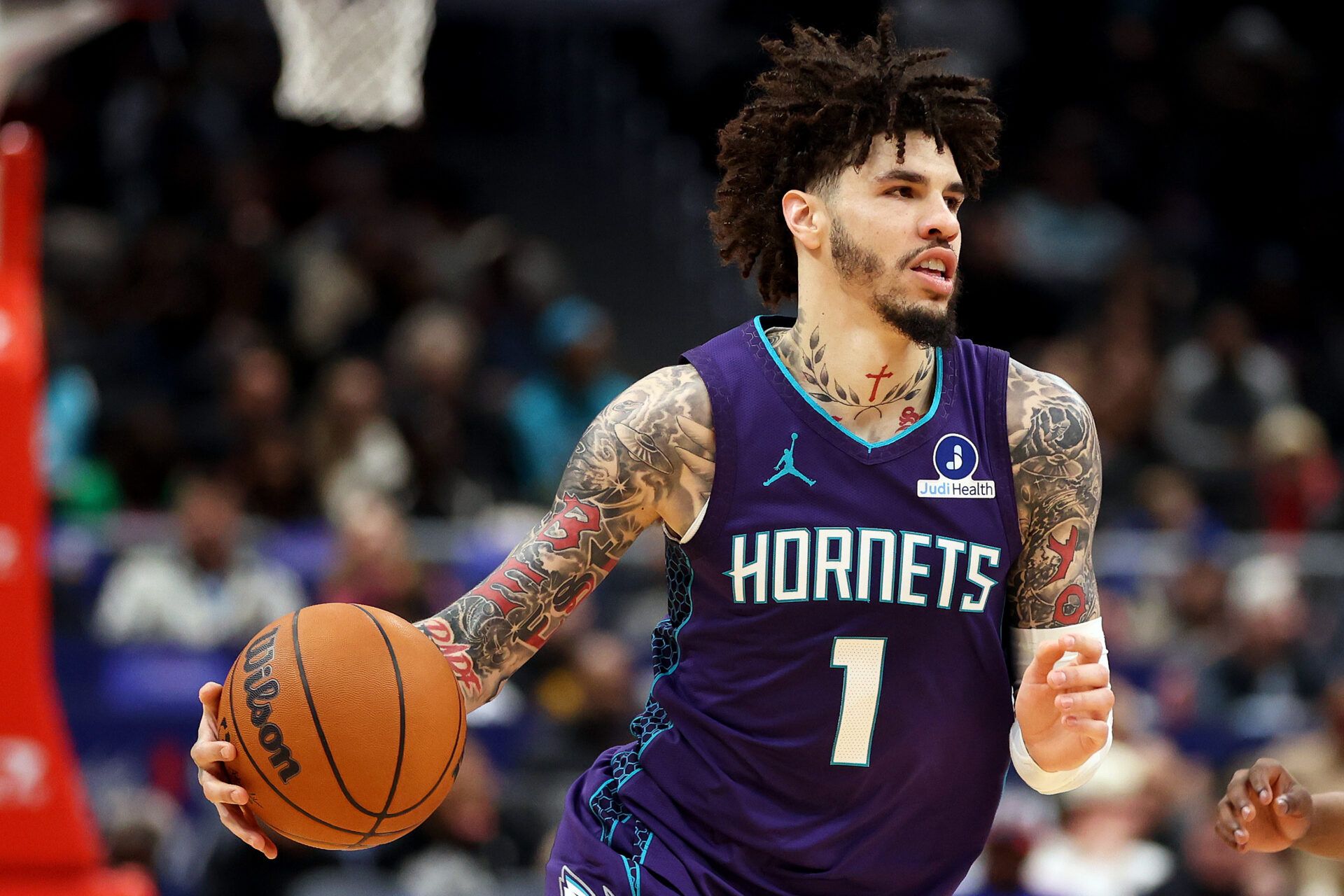 Charlotte Hornets guard LaMelo Ball (1) dribbles the ball during the second half against the Washington Wizards at Capital One Arena.