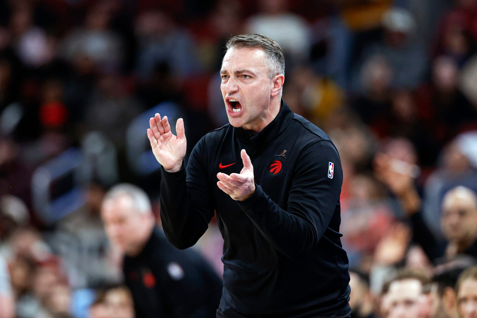 Toronto Raptors head coach Darko Rajakovic reacts during the first half at United Center.