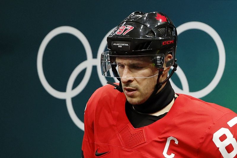 Sidney Crosby of Canada walks out to the ice before a men's ice hockey quarterfinal during the Milano Cortina 2026 Olympic Winter Games at Milano Santagiulia Ice Hockey Arena.