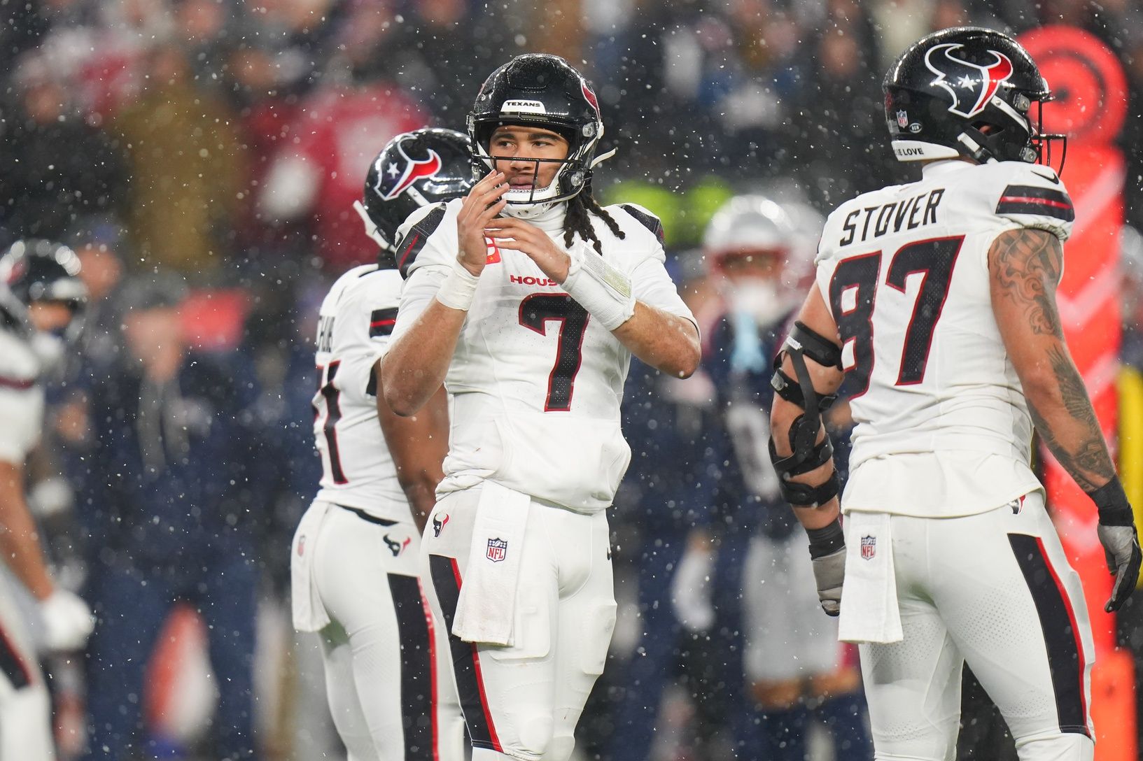 Houston Texans quarterback C.J. Stroud (7) calls for a time out in the fourth quarter against the New England Patriots in an AFC Divisional Round game at Gillette Stadium.
