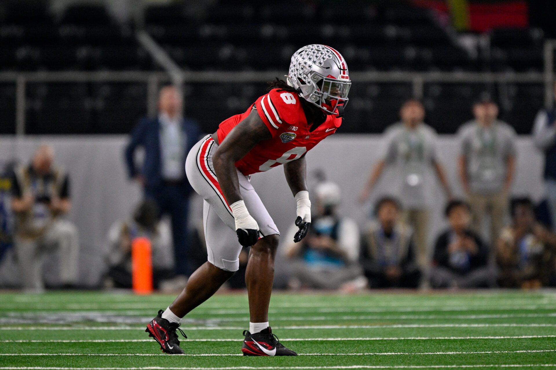 Ohio State Buckeyes linebacker Arvell Reese (8) gets into position during the 2025 Cotton Bowl and quarterfinal game of the College Football Playoff at AT&T Stadium.