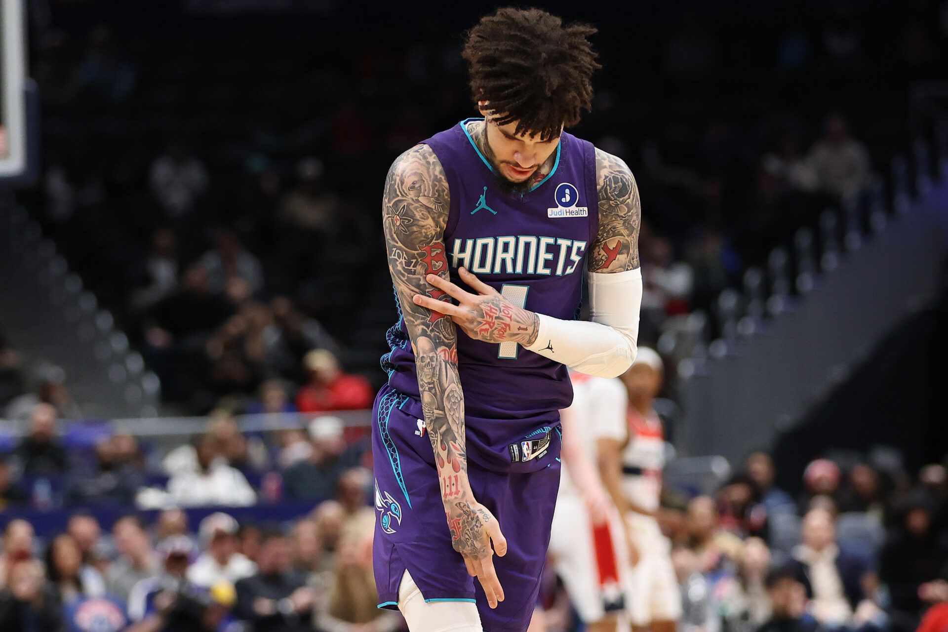 Charlotte Hornets guard LaMelo Ball (1) celebrates during the first half against the Washington Wizards at Capital One Arena.