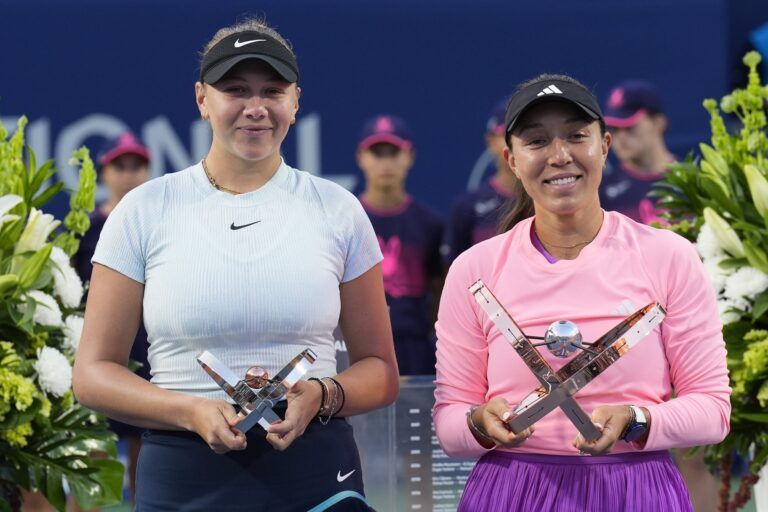 Amanda Anisimova (USA, left) and Jessica Pegula (USA, right) pose with their trophies after the women's final at Sobeys Stadium.