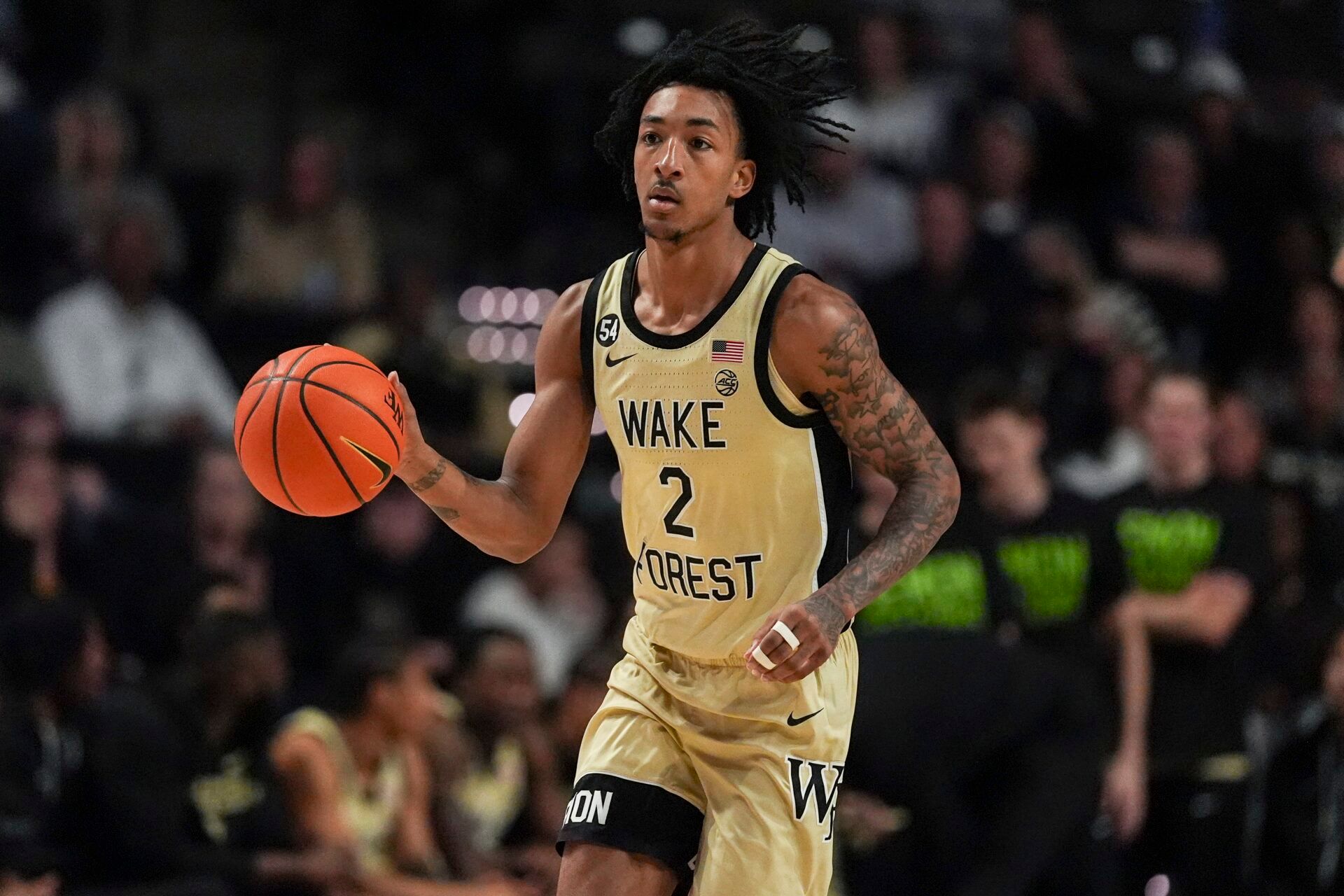 Wake Forest Demon Deacons forward Juke Harris (2) brings the ball up court during the first half against the Stanford Cardinal at Lawrence Joel Veterans Memorial Coliseum.