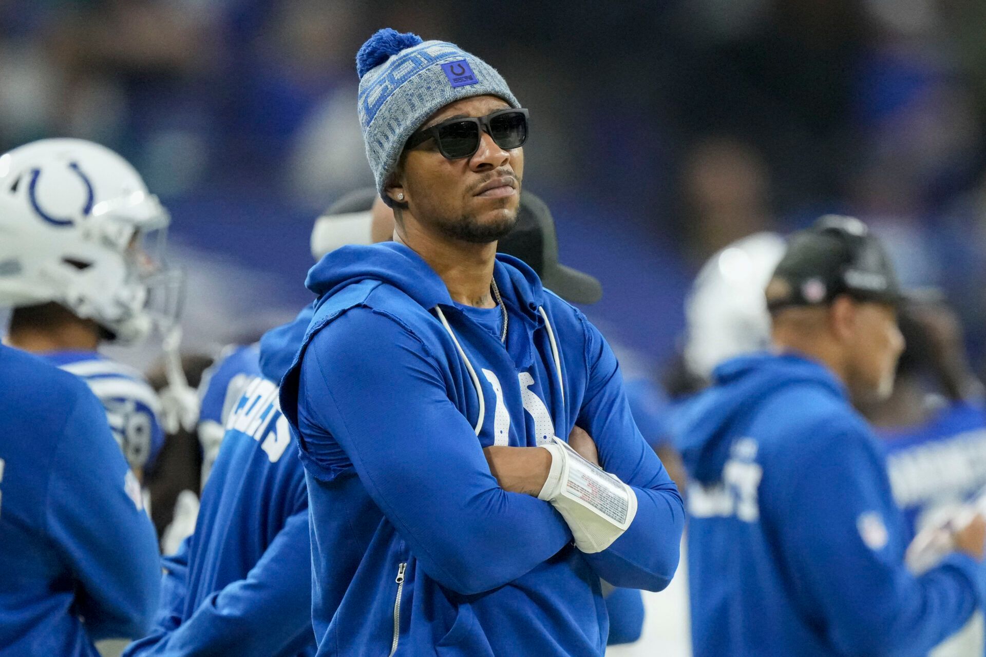 Indianapolis Colts quarterback Anthony Richardson (5) watches the action on the field from the sidelin at Lucas Oil Stadium.