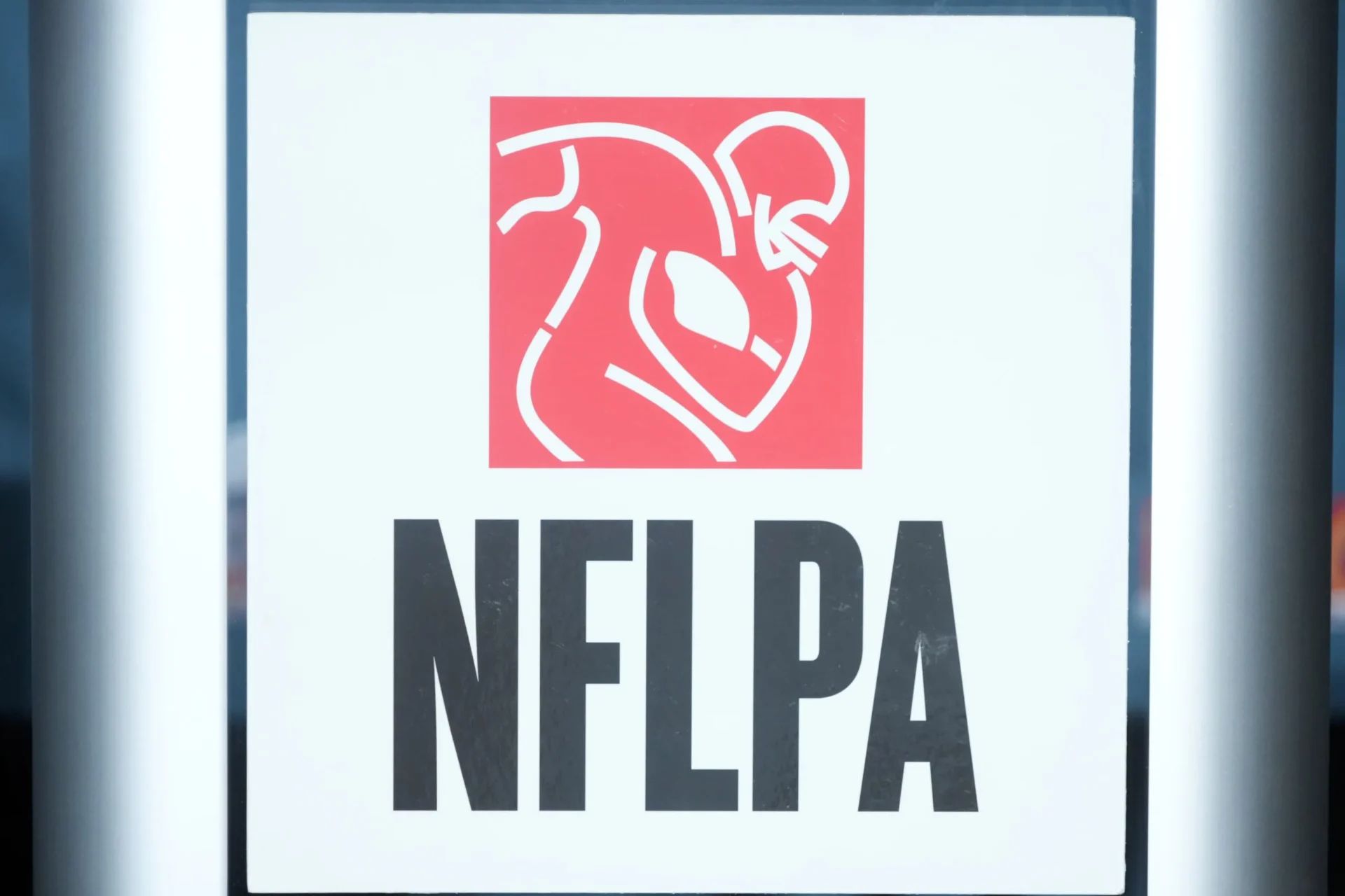 The NFLPA logo at press conference at the Super Bowl LIX media center at the  Ernest N. Morial Convention Center.