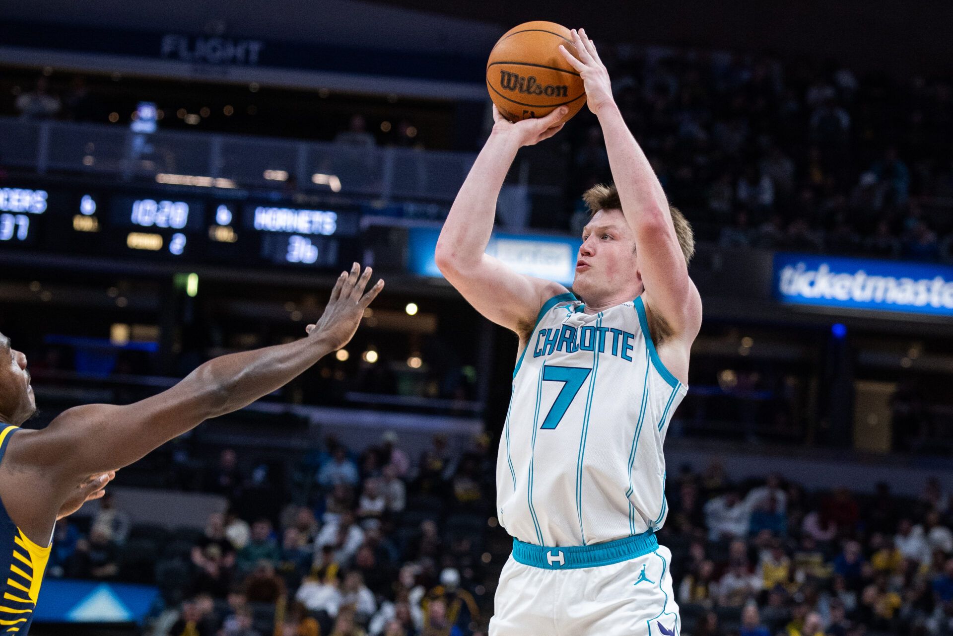 Charlotte Hornets guard Kon Knueppel (7) shoots the ball in the first half against the Indiana Pacers  at Gainbridge Fieldhouse.