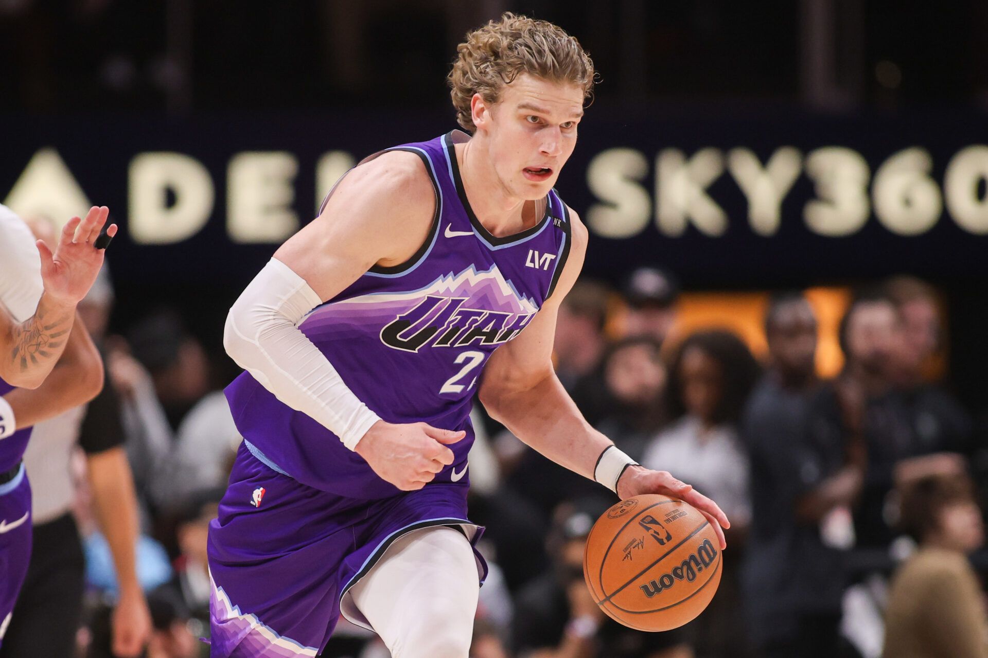 Utah Jazz forward Lauri Markkanen (23) dribbles against the Atlanta Hawks in the third quarter at State Farm Arena.
